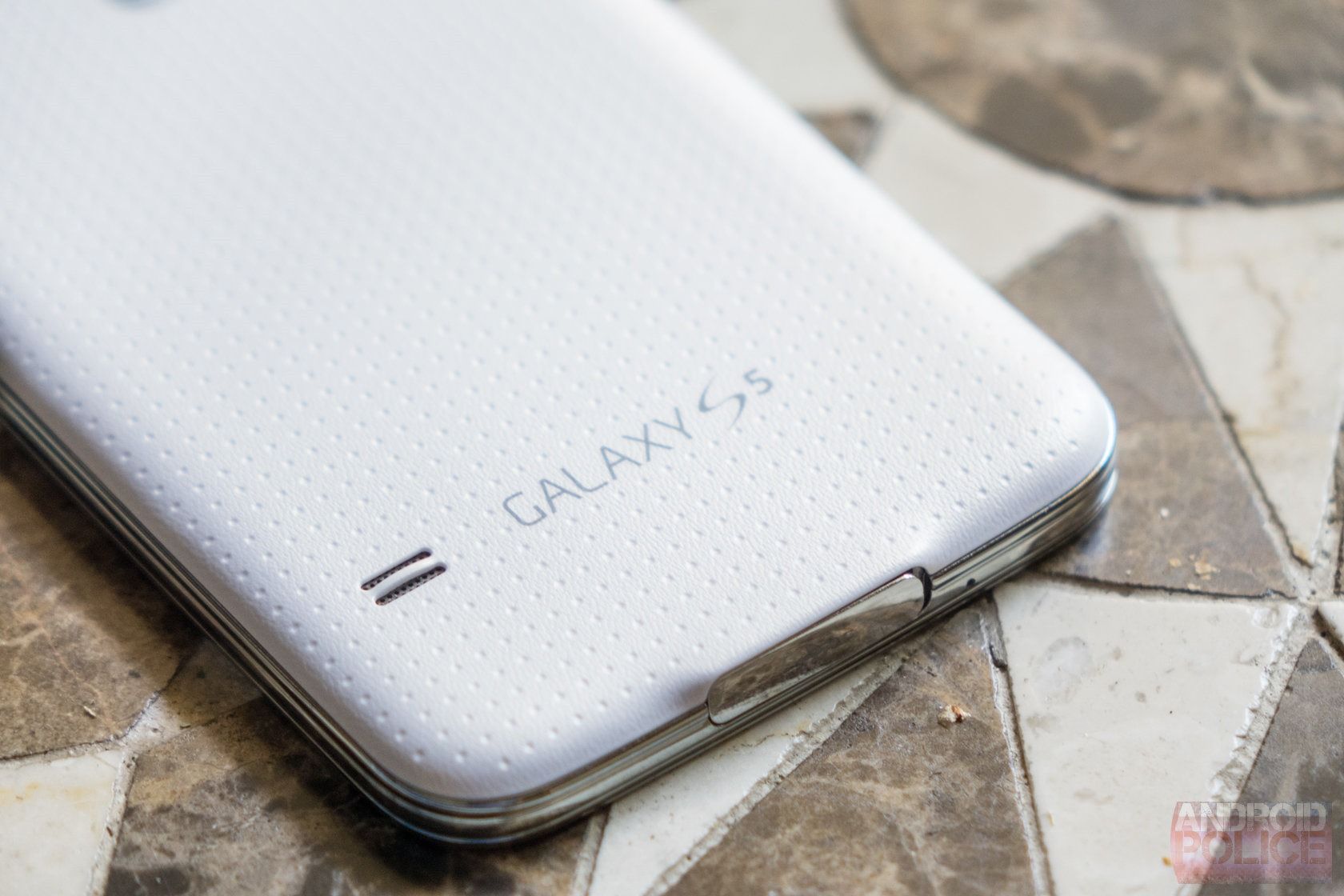The dimpled back panel of the Samsung Galaxy S5 