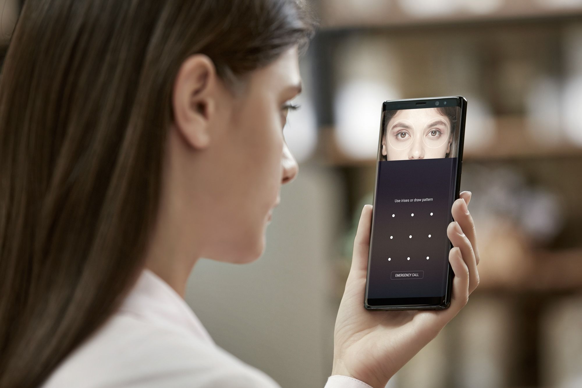 woman using iris scanner