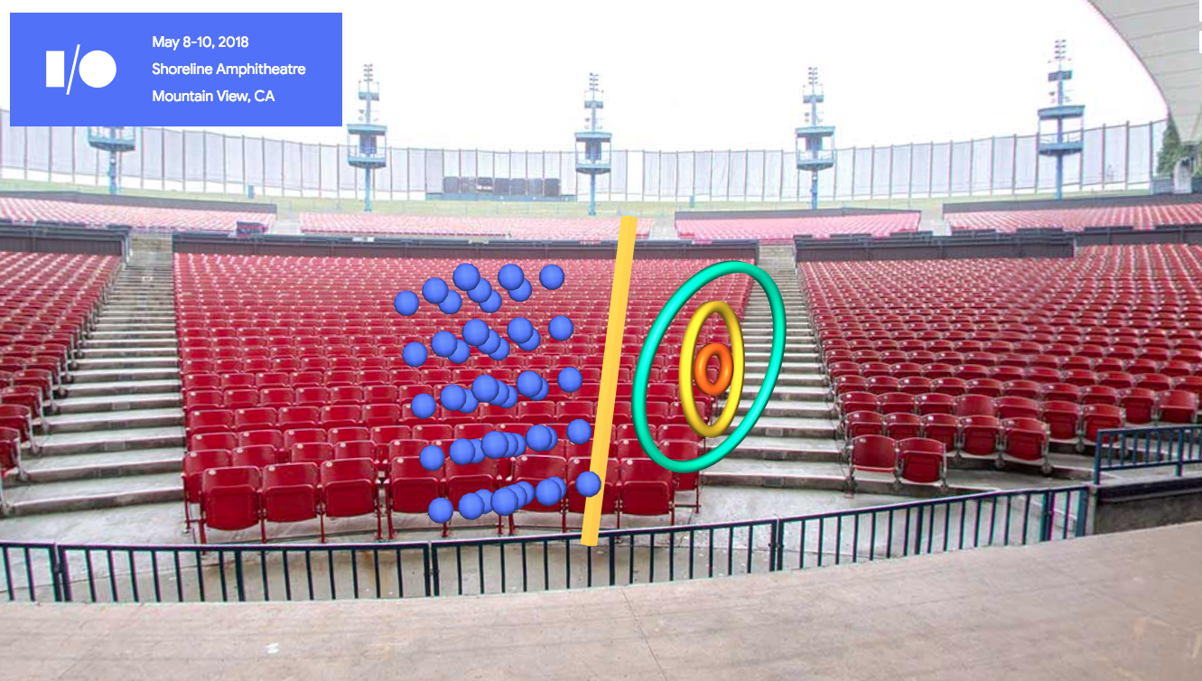 an auditorium with red seats and stylized google i/o logo in augmented reality