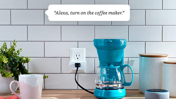 A blue coffee maker connected to an Amazon Smart Plug.