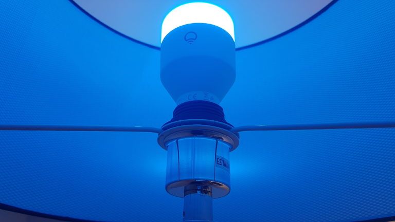 Picture of a LIFX bulb lit up in light blue