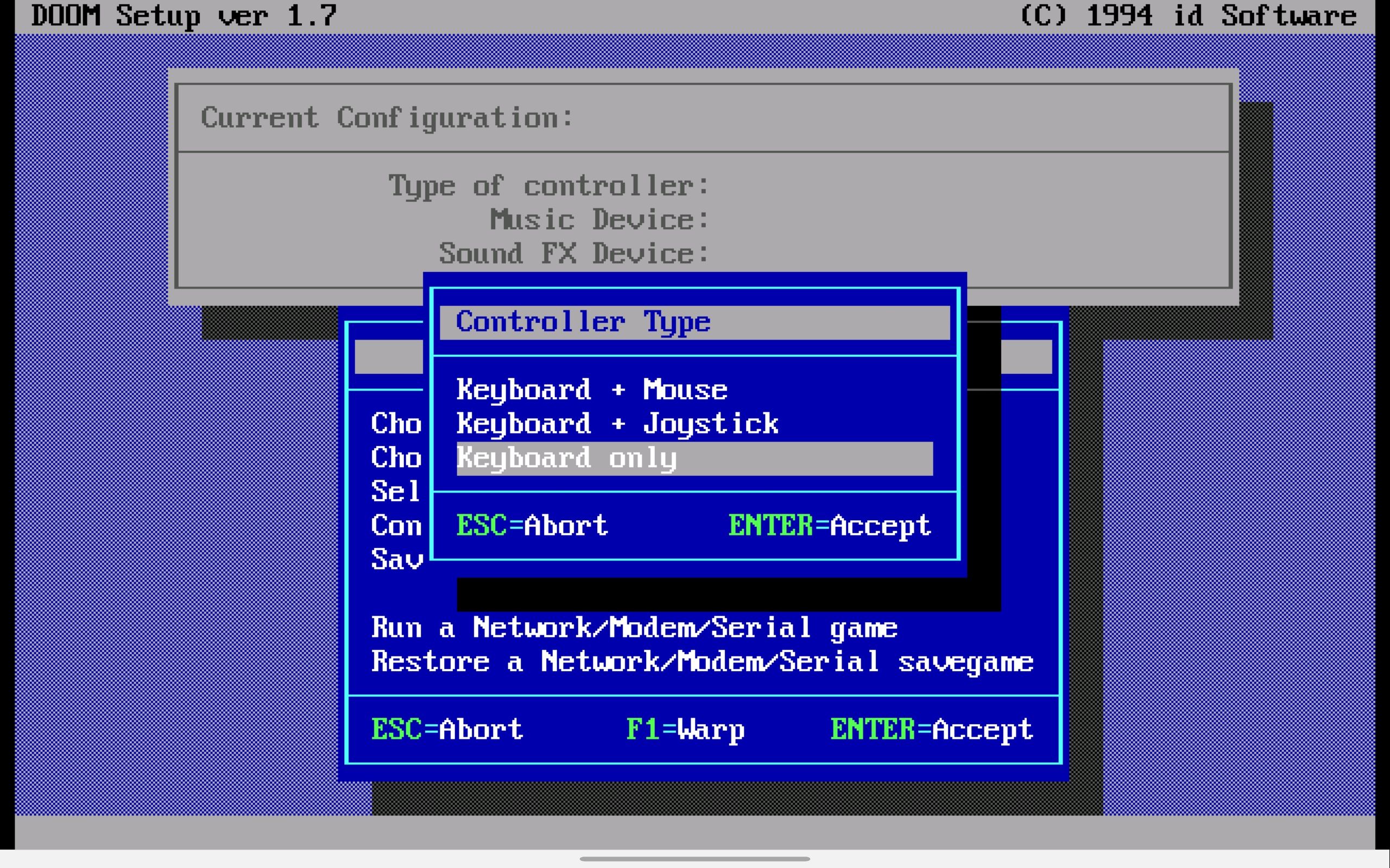 dos emulator with blue and grey windows over blue pink and dark blue background