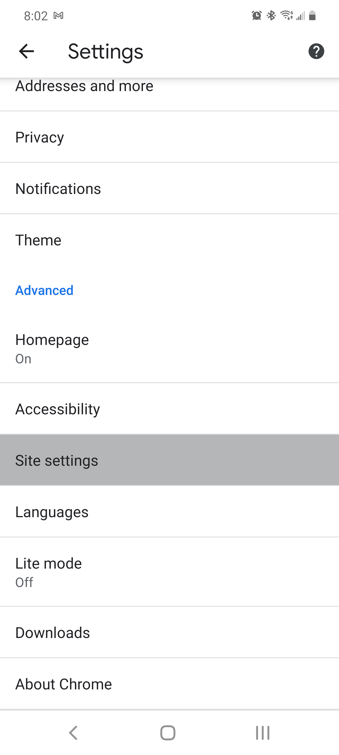 The Chrome mobile app's Settings menu with the Site settings option highlighted