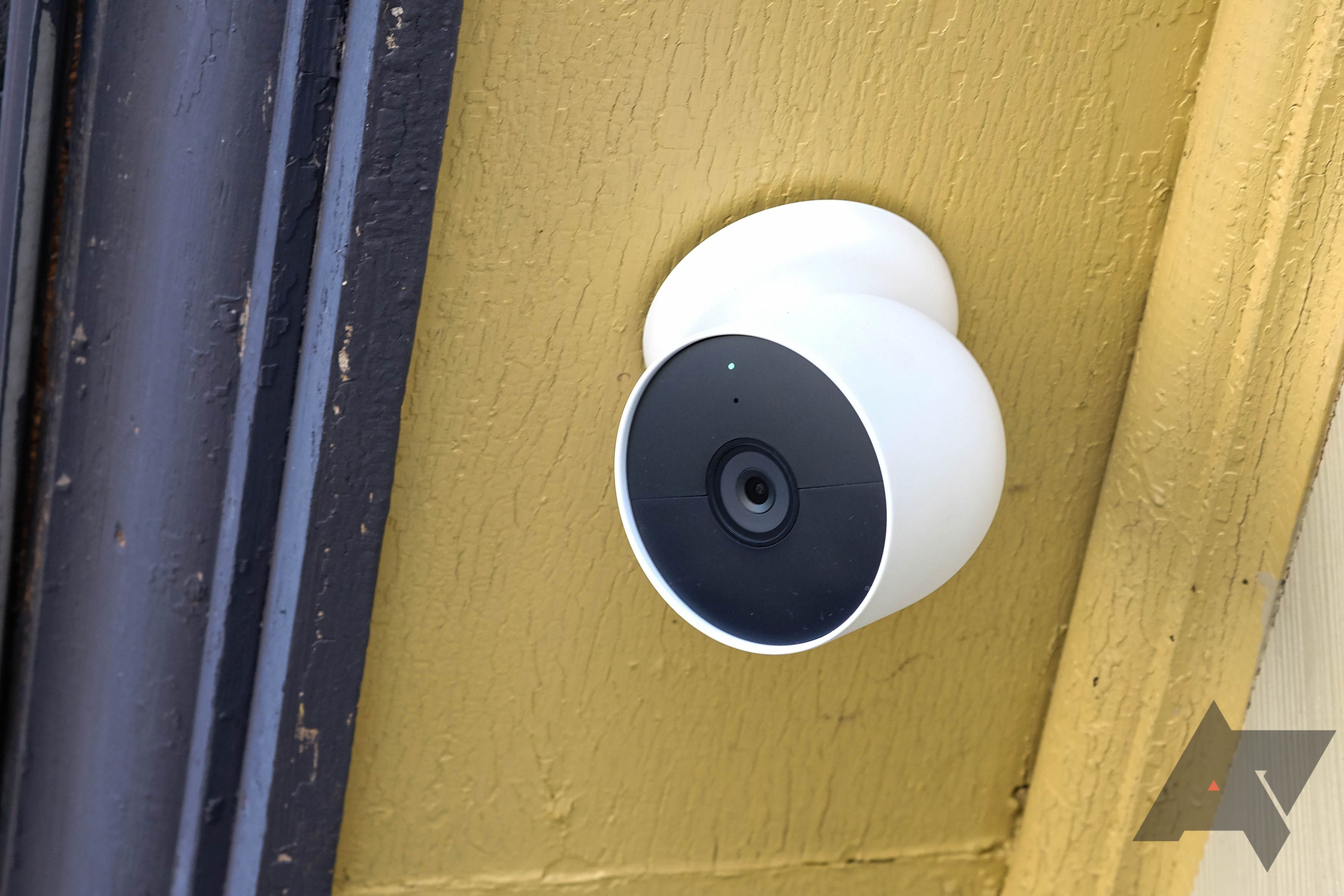 A Nest Cam Battery mounted outdoors.