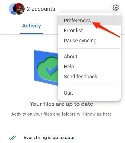 Screenshot shows account settings options with an arrow pointing to 'Preferences' in the Google Drive desktop widget.