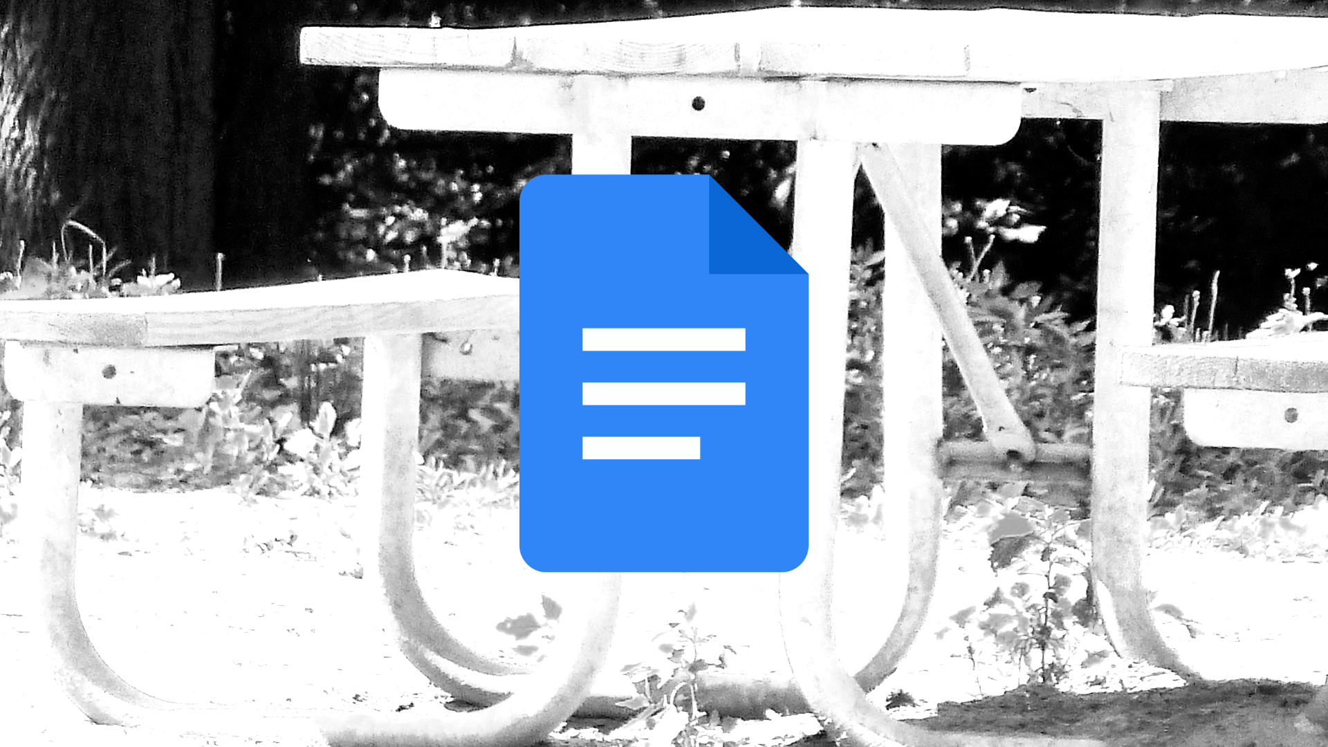 The Google Docs logo with a black-and-white image of a picnic table in the background