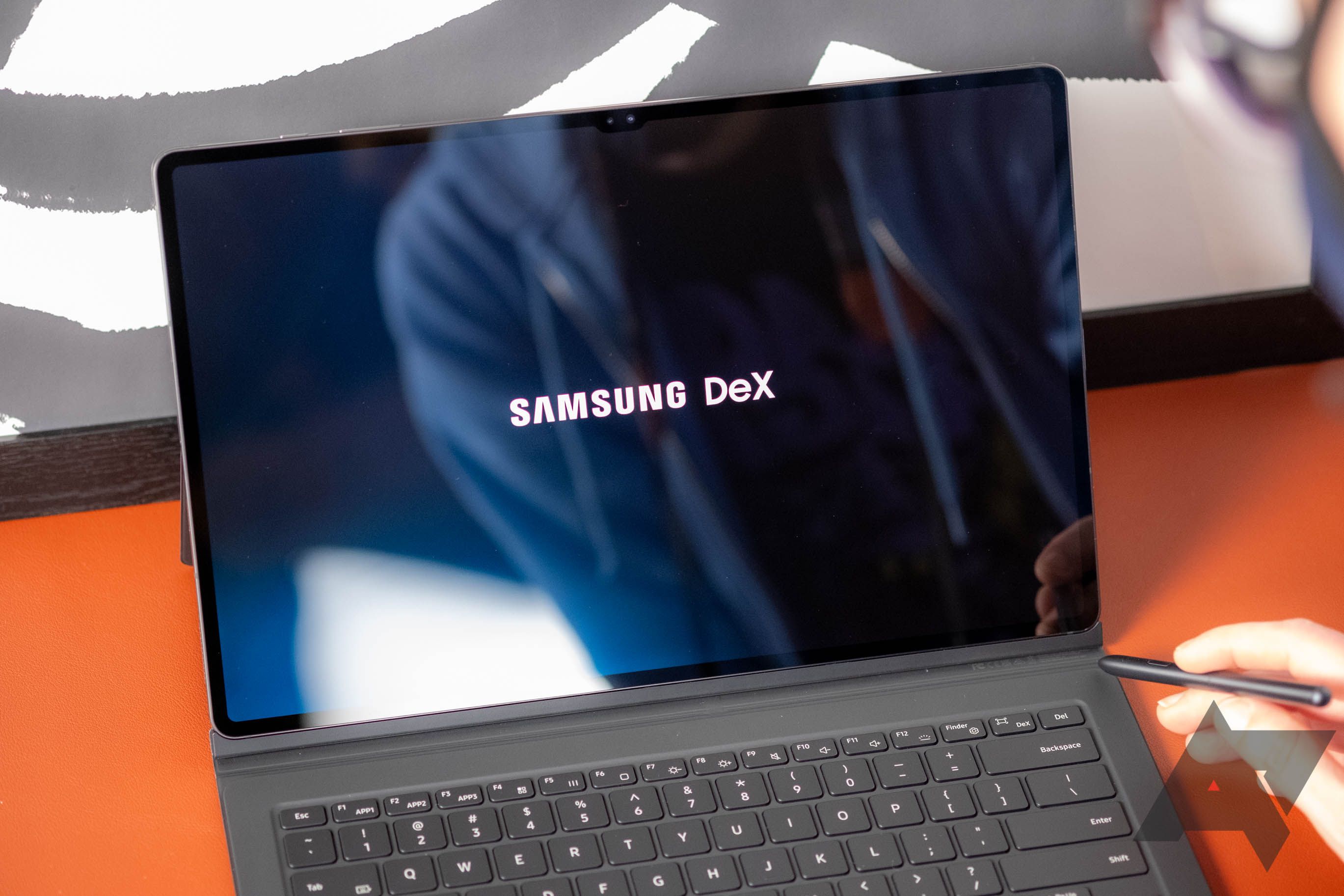 A person about to use Samsung DeX tablet