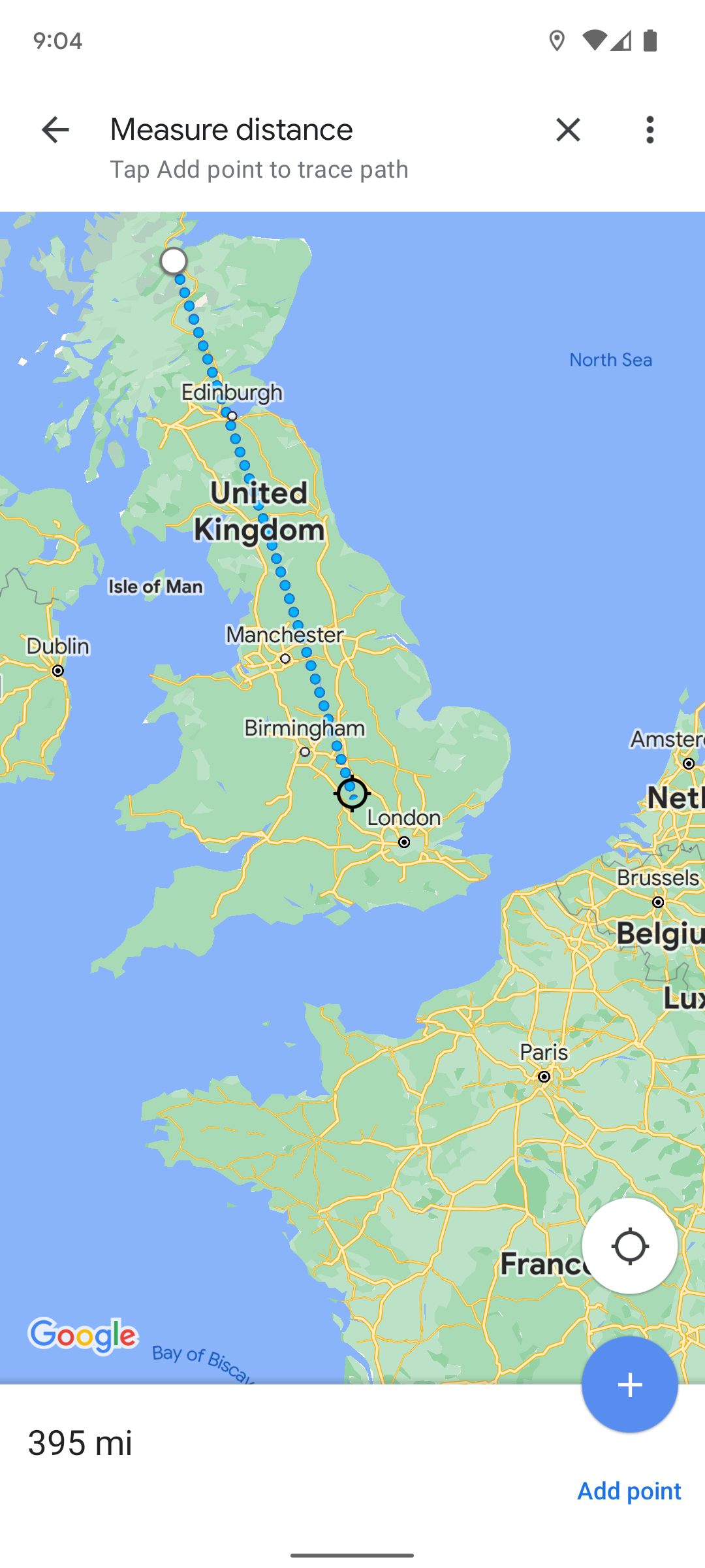 Screenshot shows the 'Measure distance' tool being used in Google Maps. There are two points on the map with a line between them and '395 mi' displayed in the lower left.