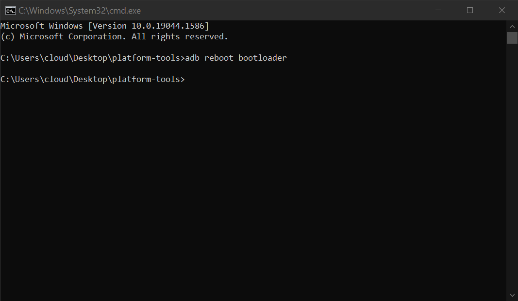 Running the "adb reboot bootloader" command in a Windows command prompt.
