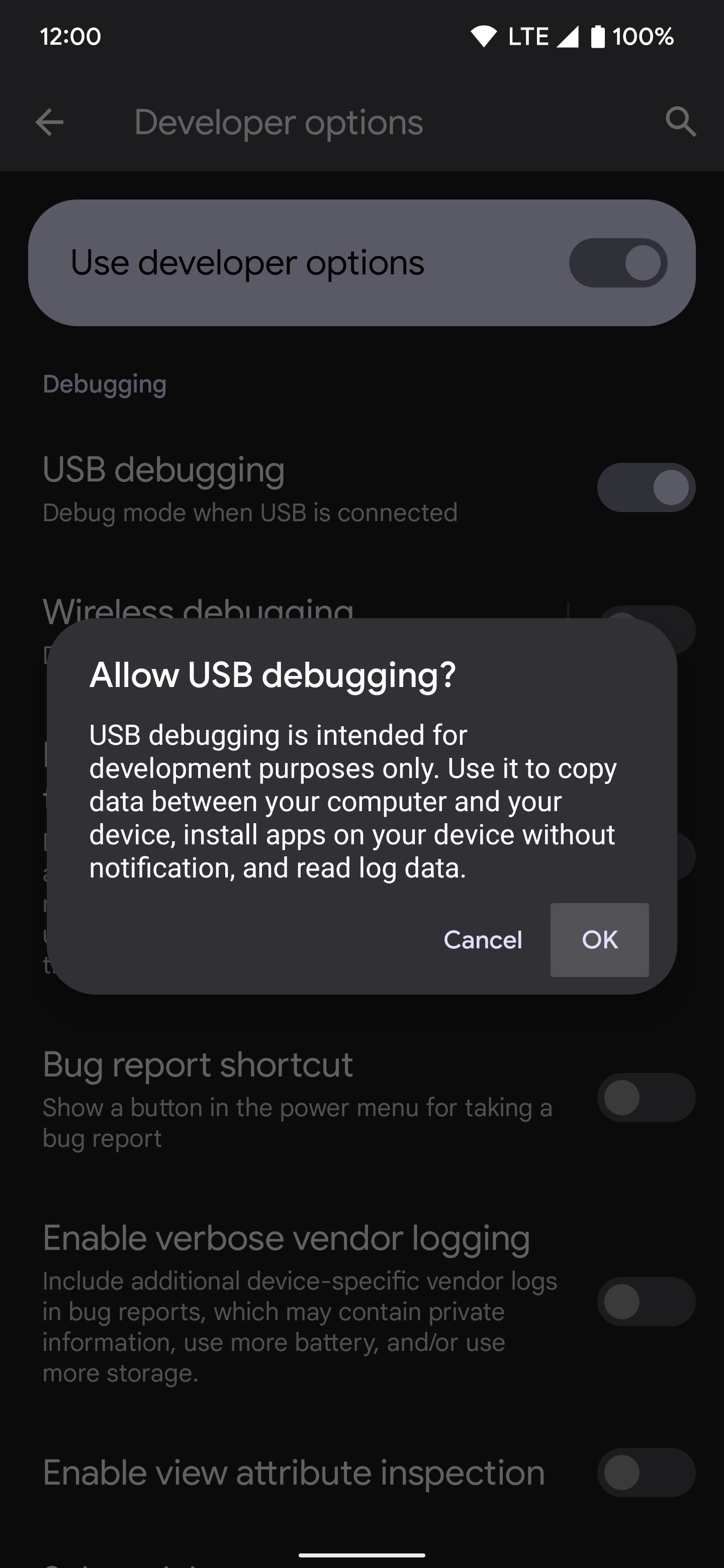 Pressing the OK button to enable the wired USB debugging option.