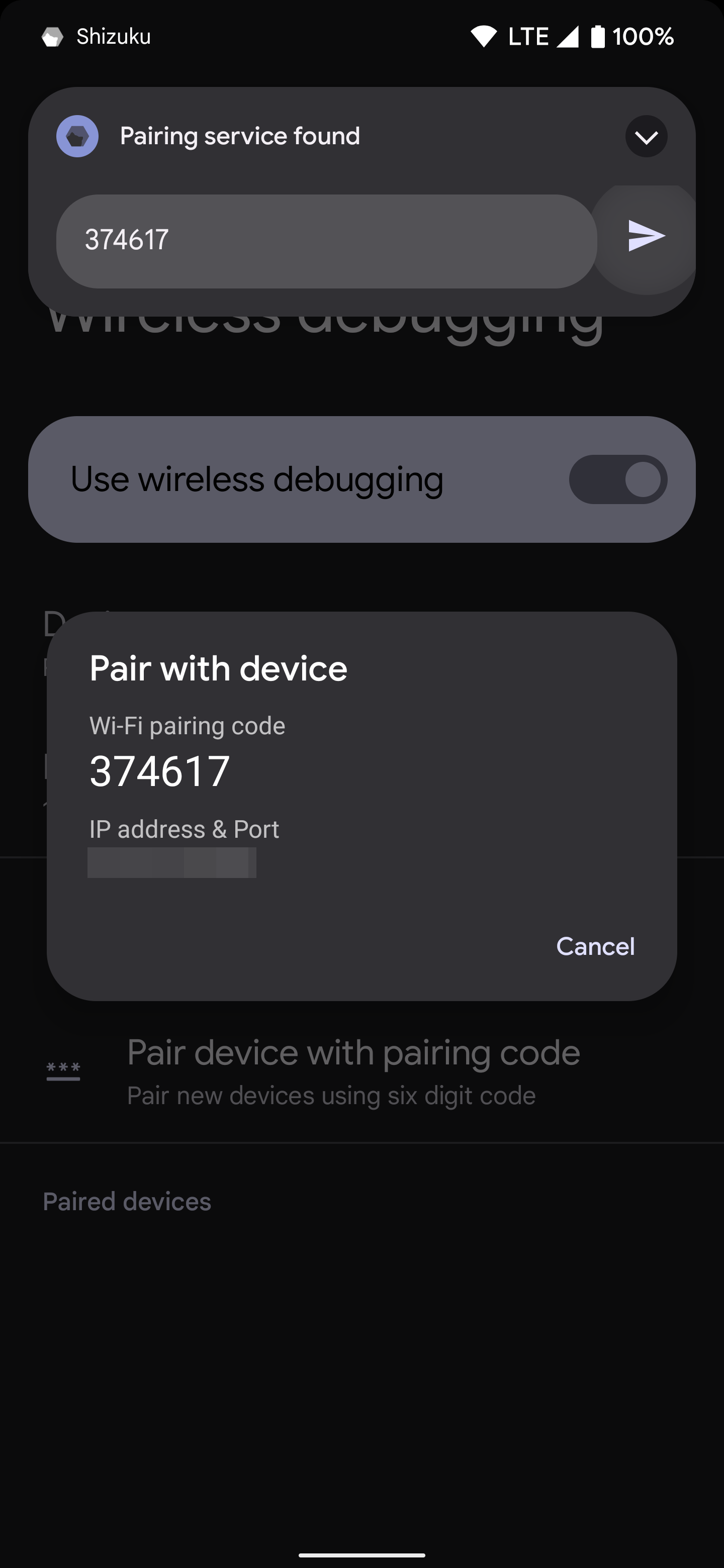 Inputting the unique wireless pairing code for the Shizuku app.