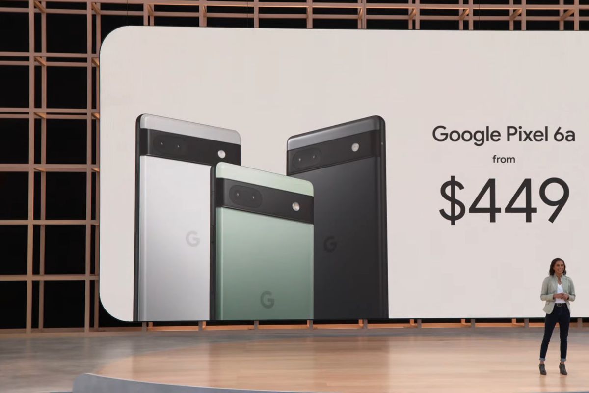 Woman standing on stage in front of an image of the Google Pixel 6a models with the text "Google Pixel 6a from $449"