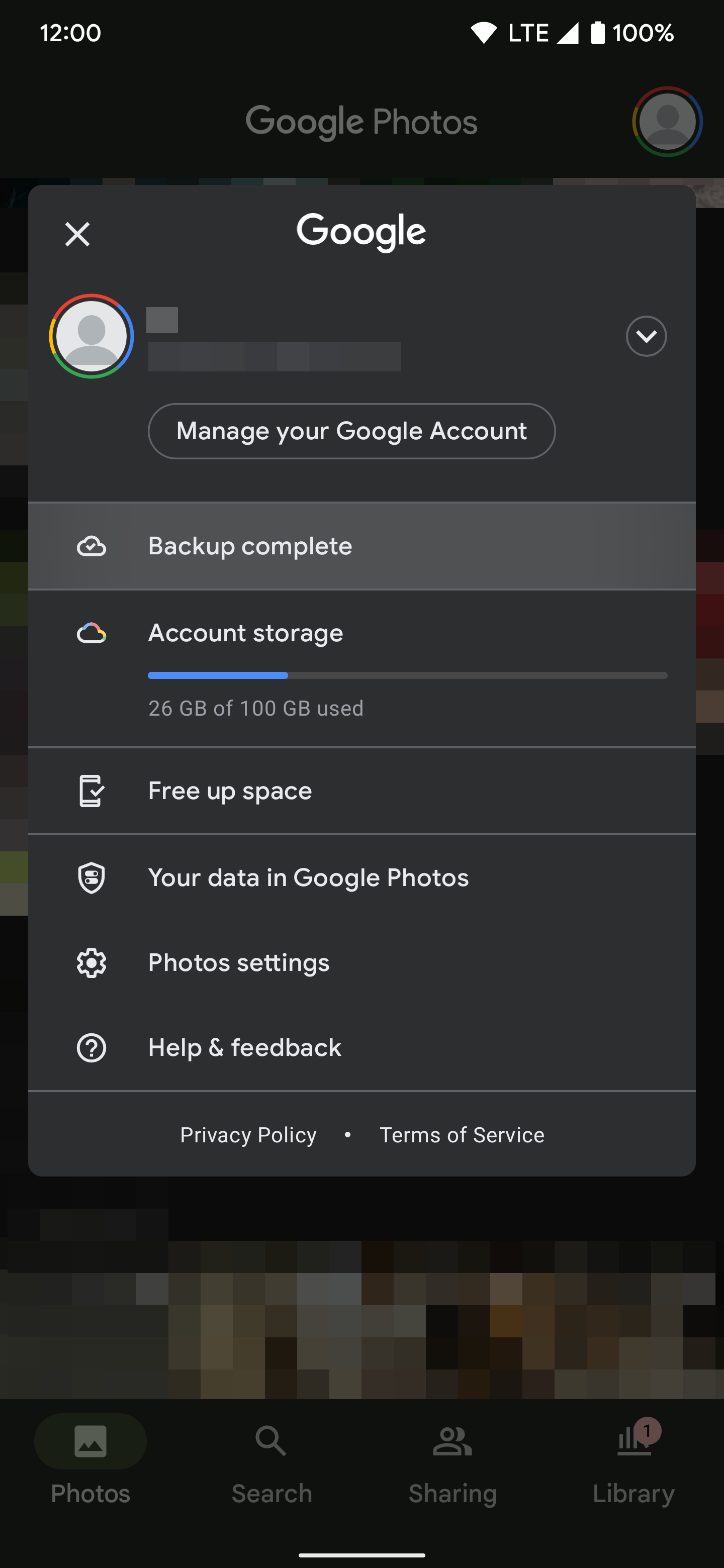 The file upload is now done for the Google Photos app with a status showing it's complete