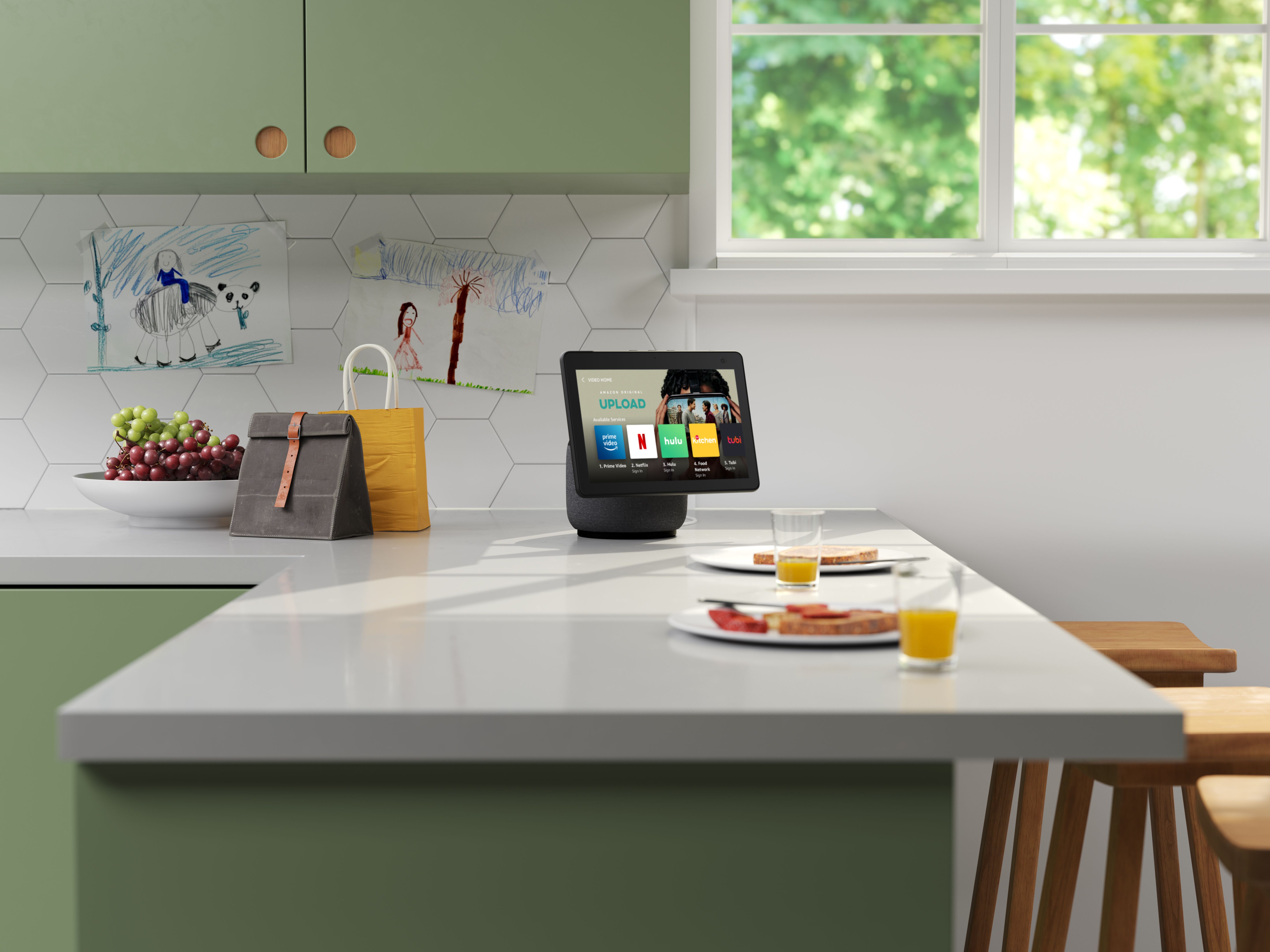 Picture of an Amazon Echo Show 10 placed on a kitchen counter
