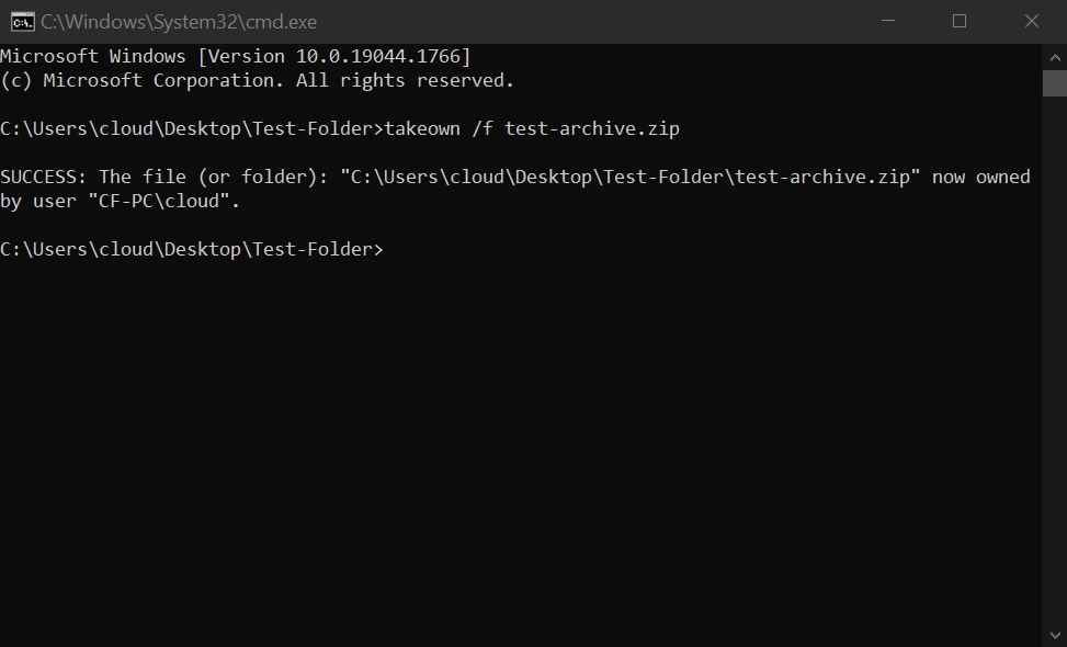 Successfully reclaiming ownership of the test file using the takeown command.