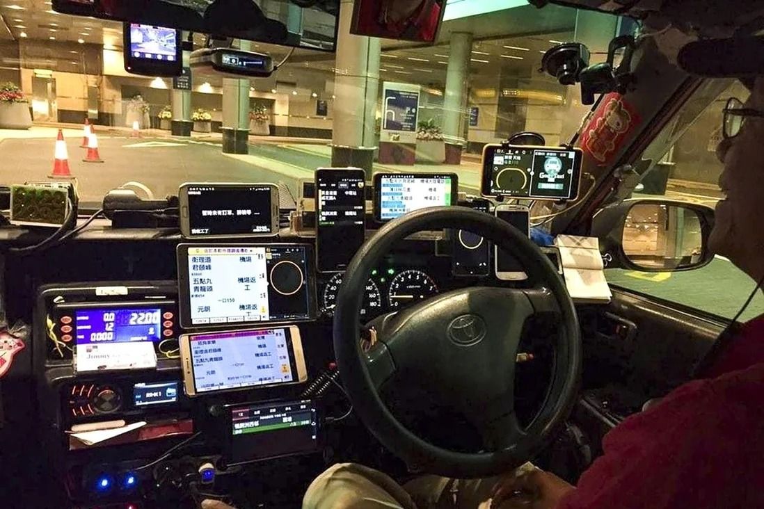 Guy With Multiple Phones On Car 1