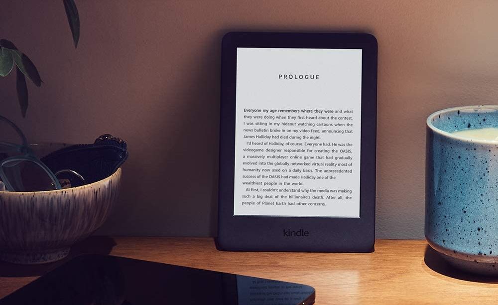 A Kindle e-reader placed on a desk