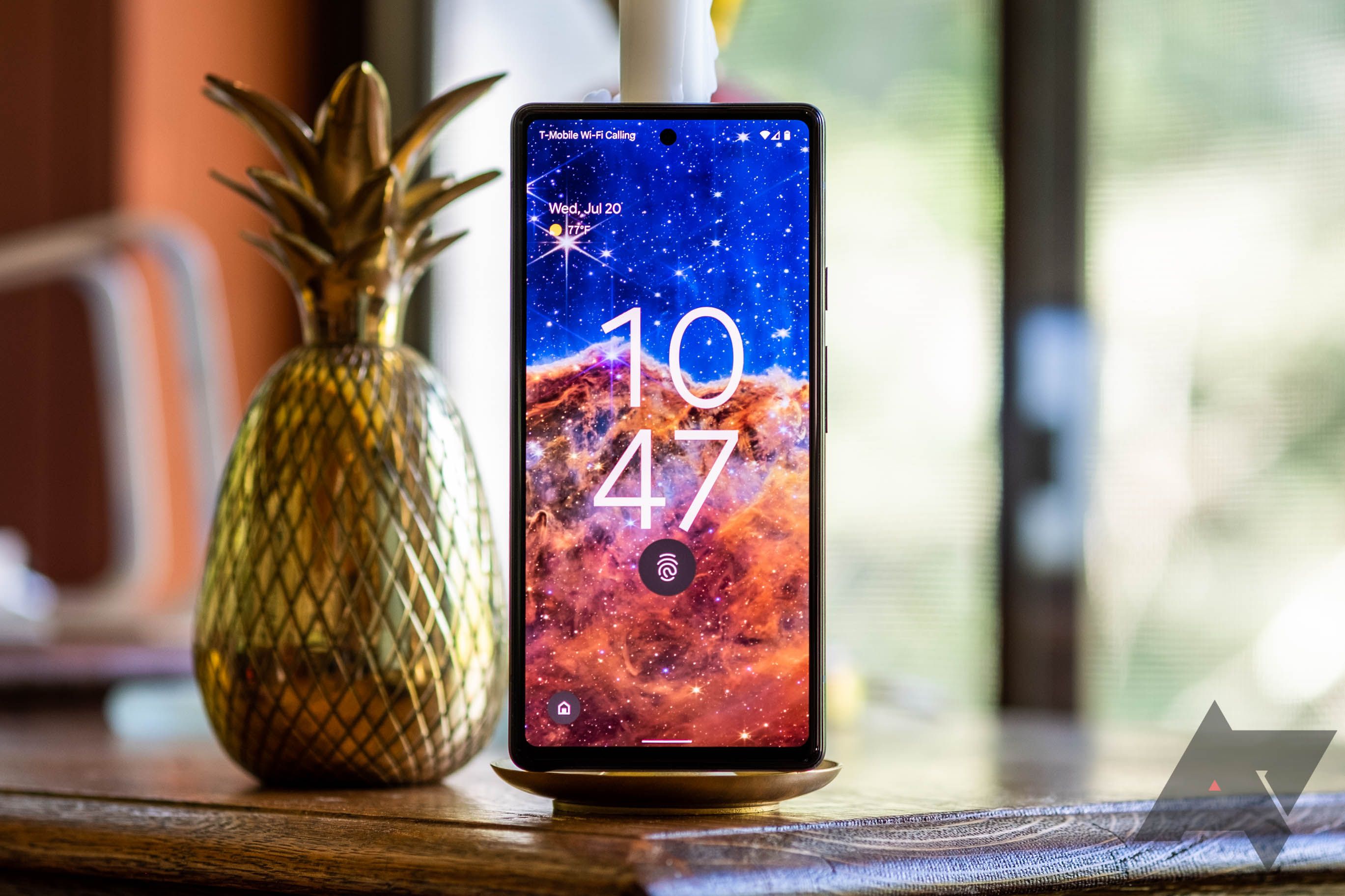 Pixel 6a next to a golden pineapple