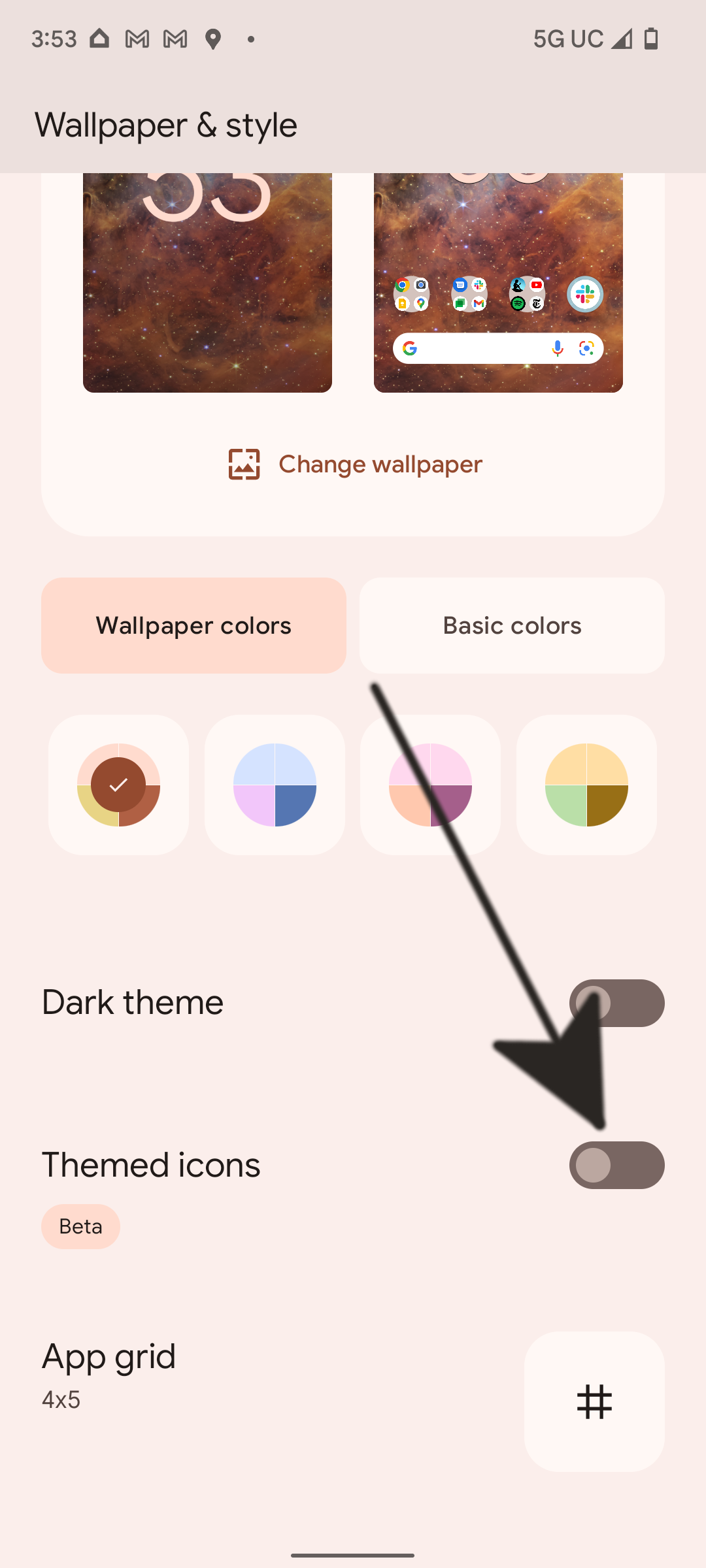 The Wallpaper & style options on a Pixel phone with an arrow pointing to the Themed icons toggle