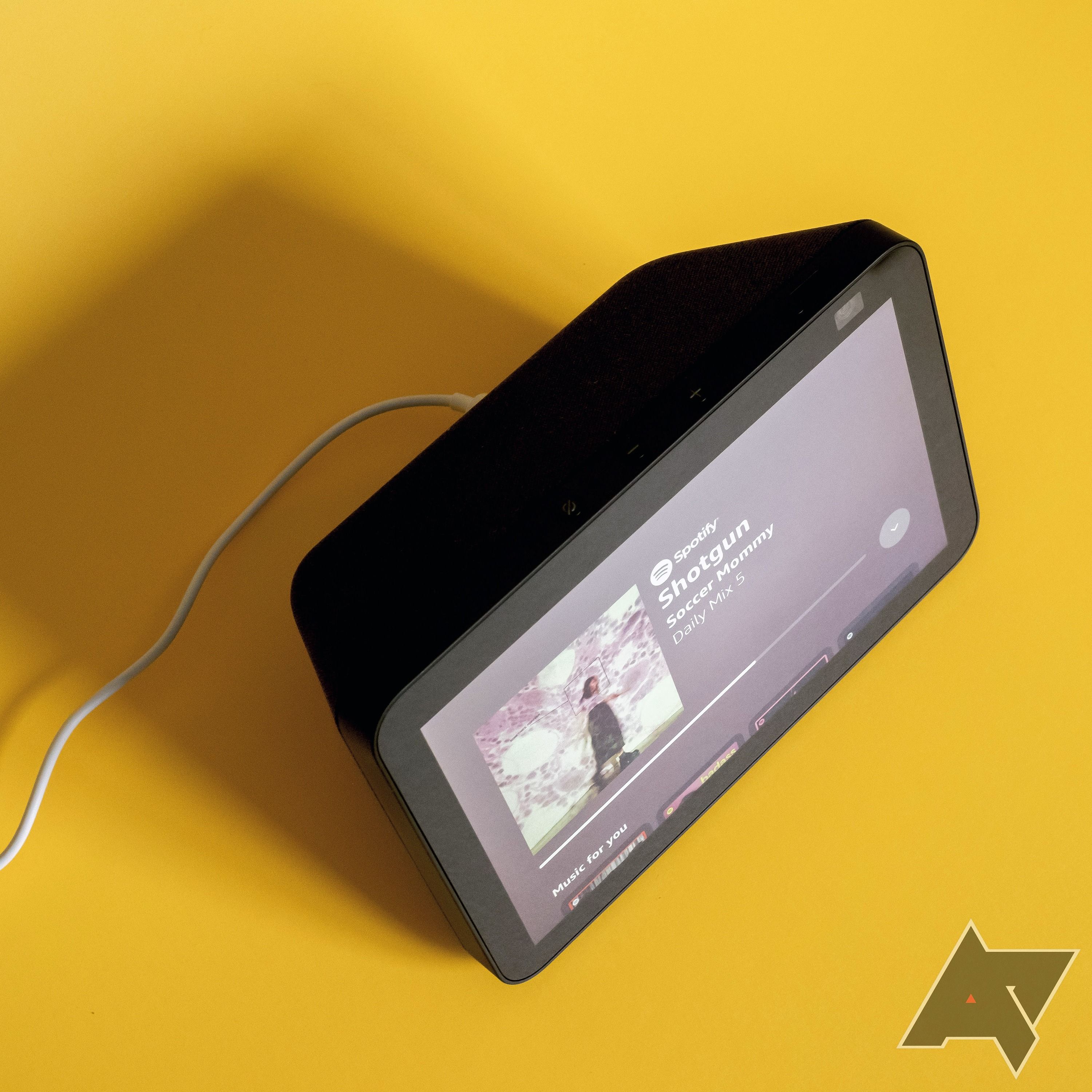 Top view of a second generation Amazon Echo Show 8 placed on a yellow surface