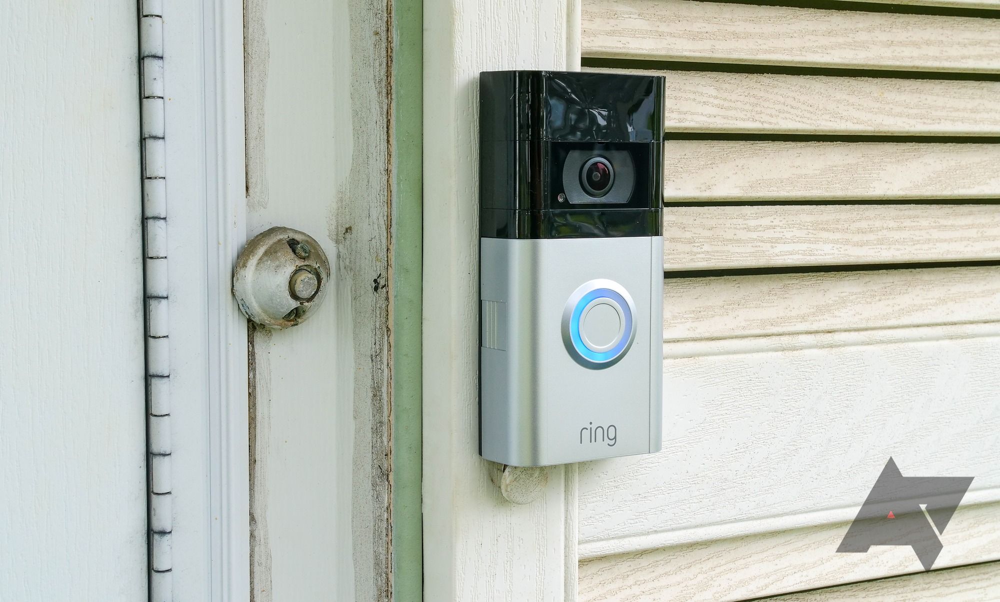 The Ring Video Doorbell 4 mounted by a door