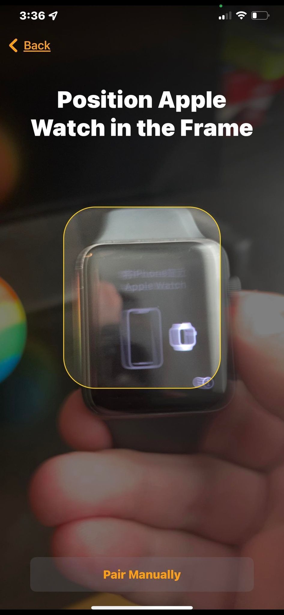 An Apple Watch positioned in a frame for pairing in the Apple Watch app