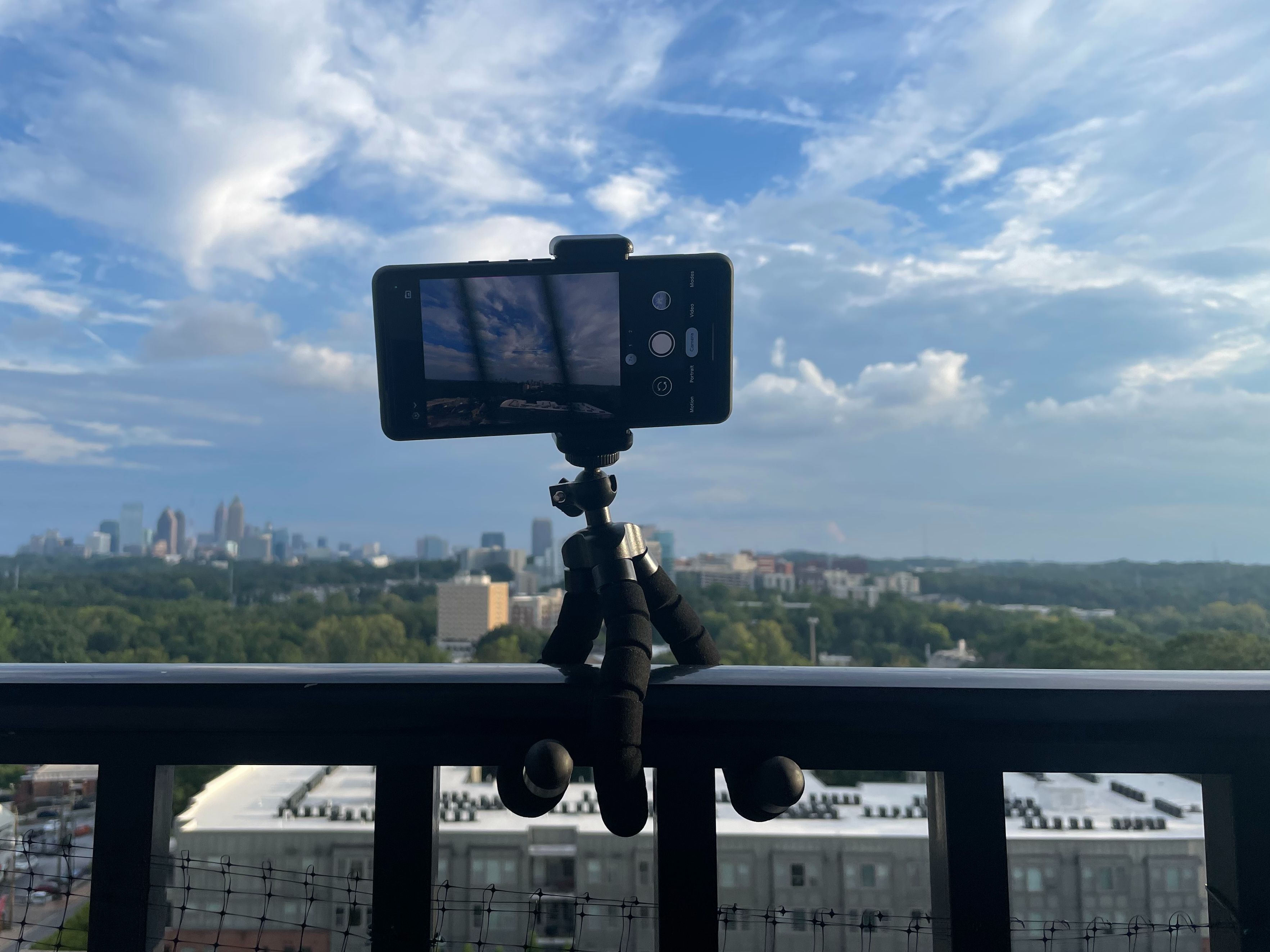 tripod with Pixel 6 on railing