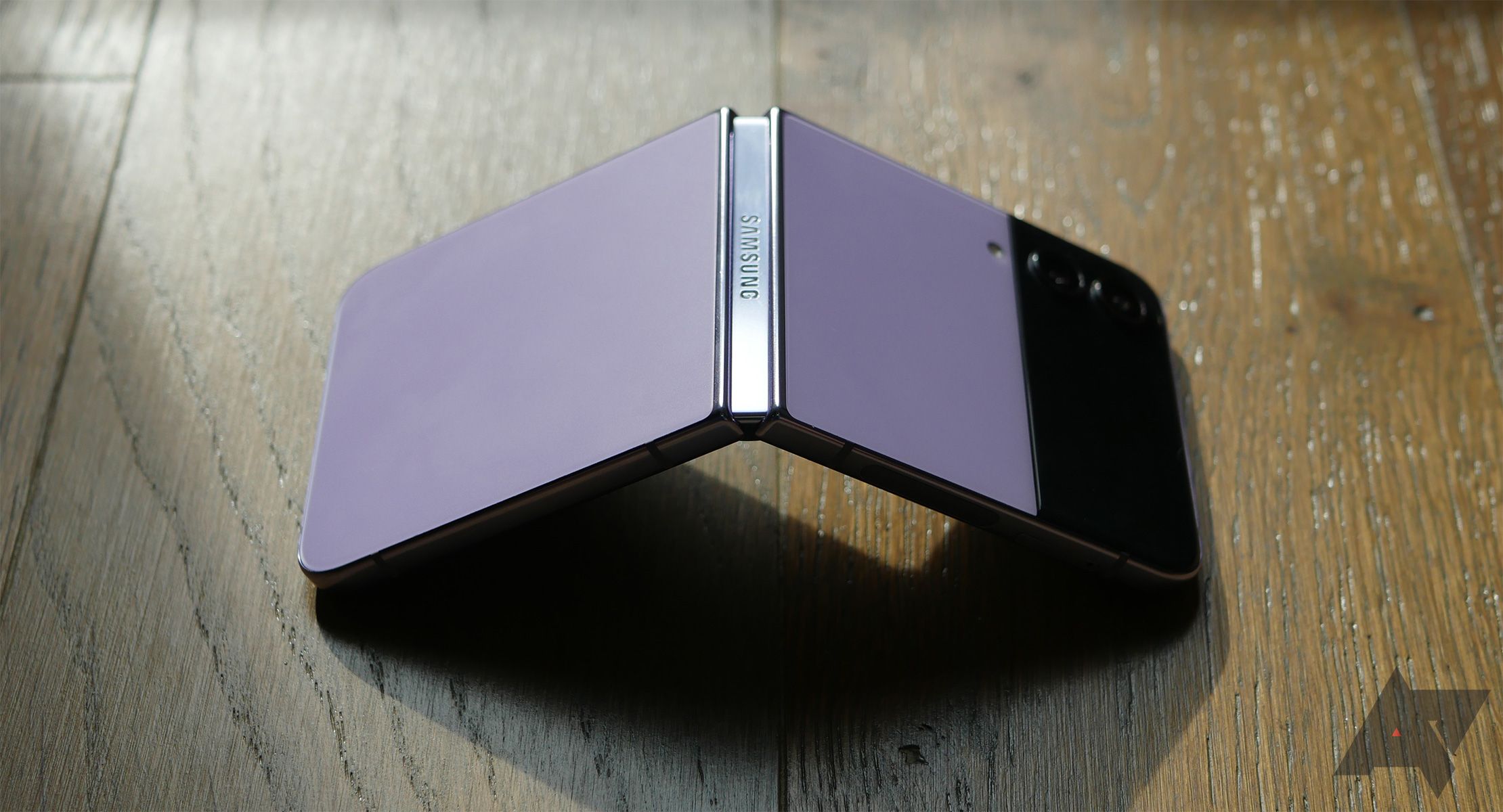 The Galaxy Z Flip 4 propped open and facing down on a table.