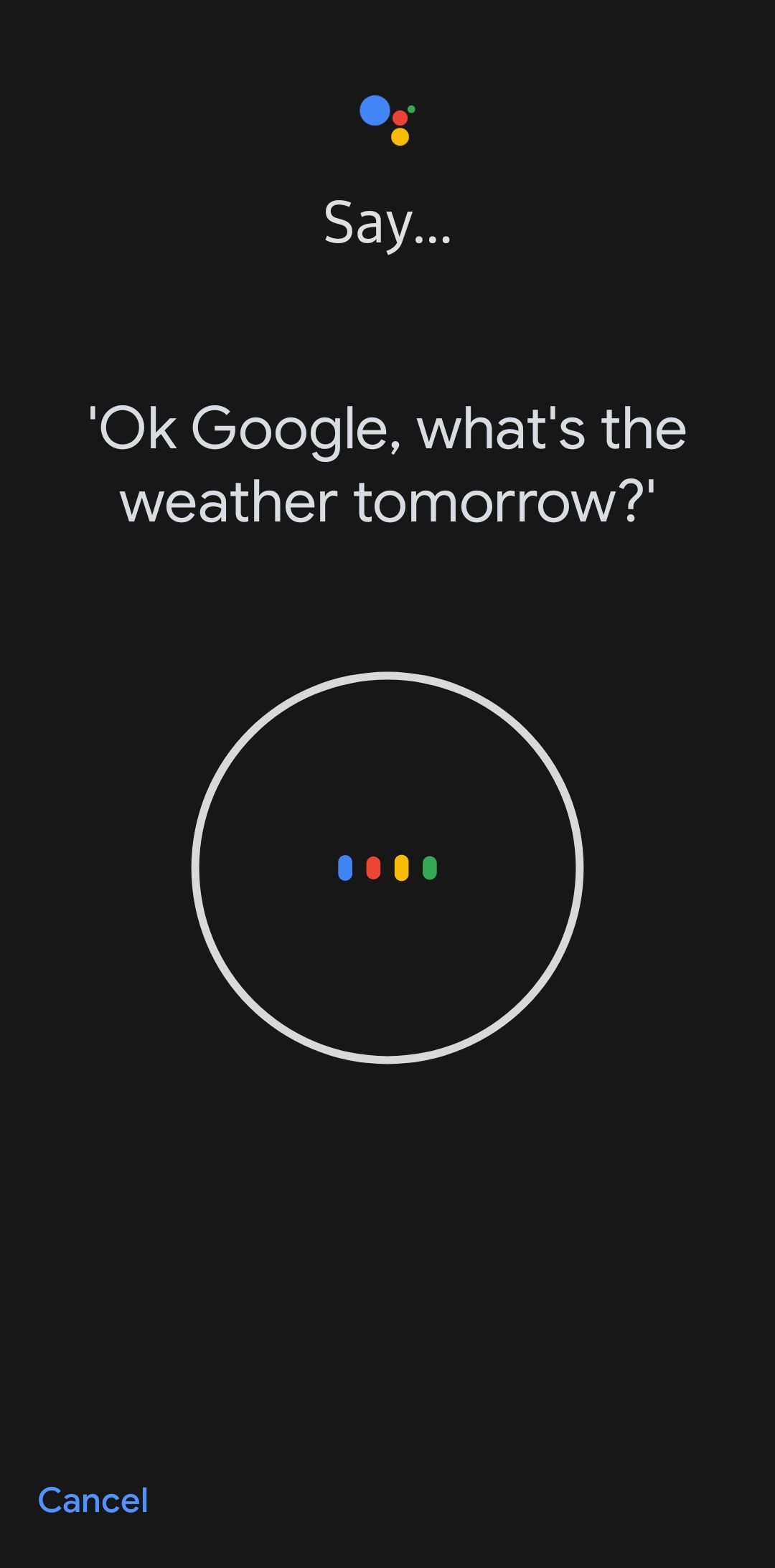 a black screen with a large microphone indicating the google assistant is recording to retrain the voice model