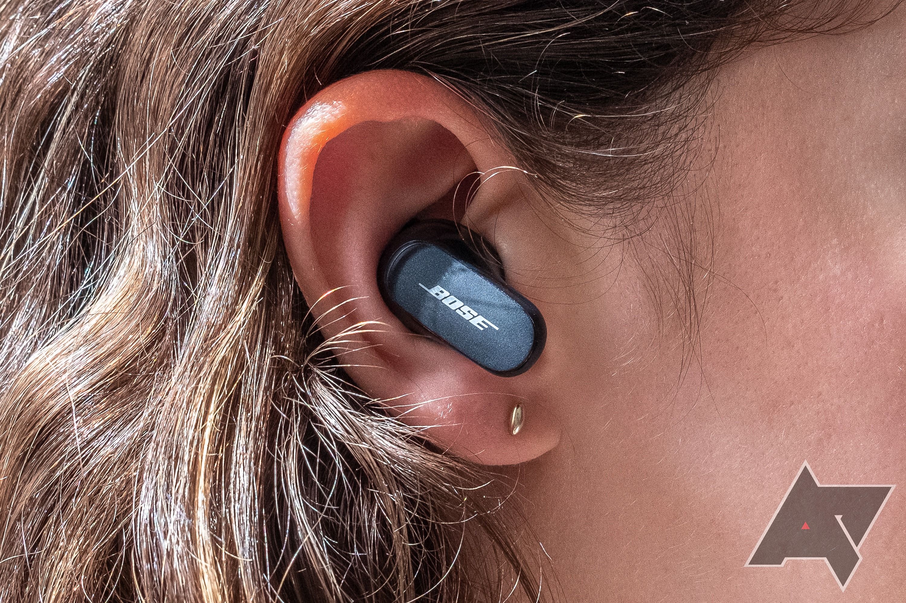 Bose QuietComfort Earbuds II earbud in an ear.