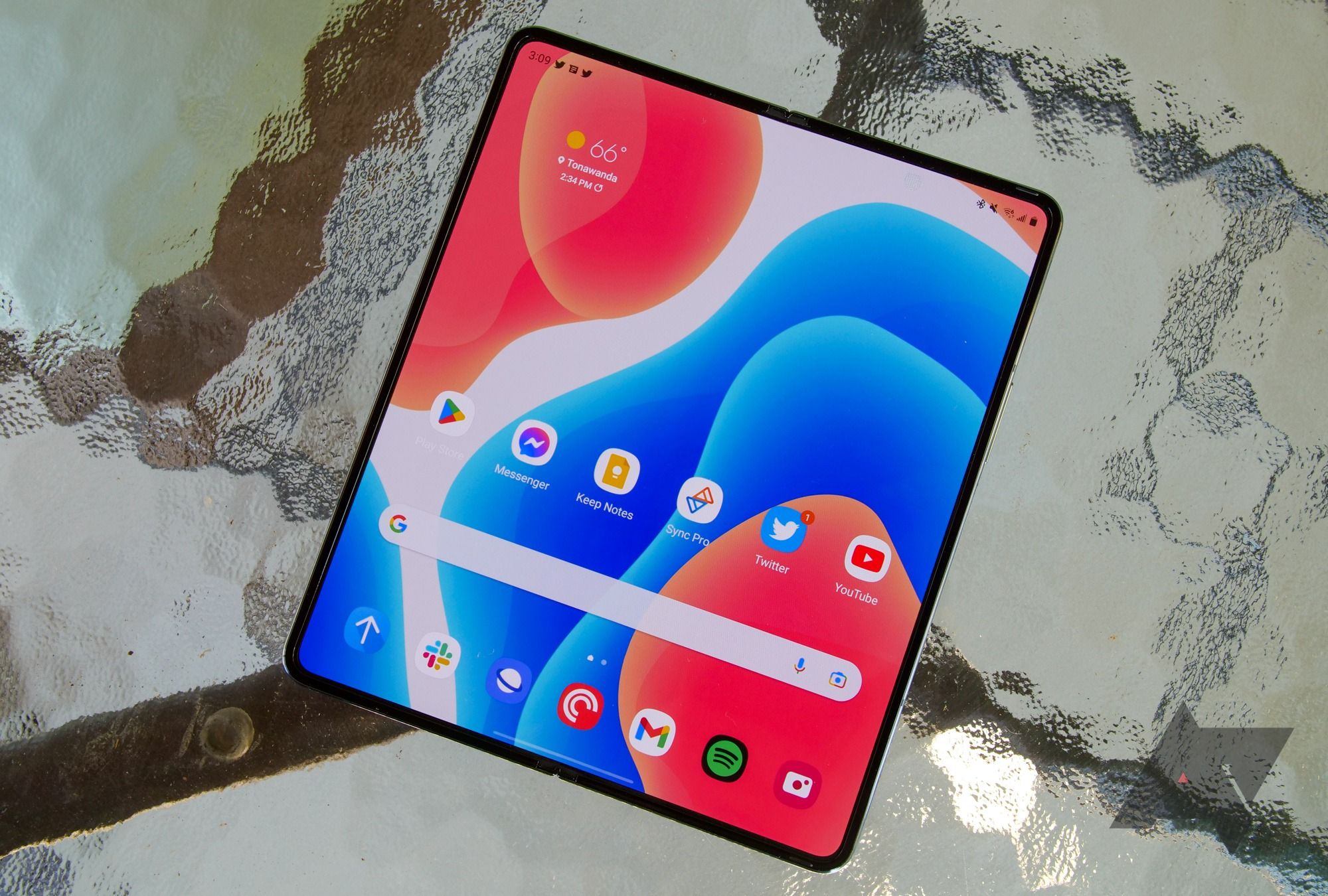 The Samsung Galaxy Z Fold 4 on a multi-color table