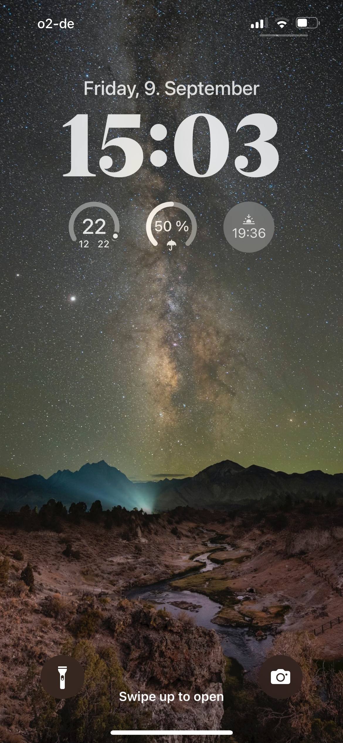 The iOS 16 lock screen showing widgets