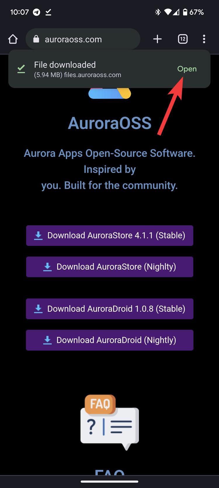 The Aurora Store website with a File downloaded pop up and a red arrow pointing to the open button on the pop up