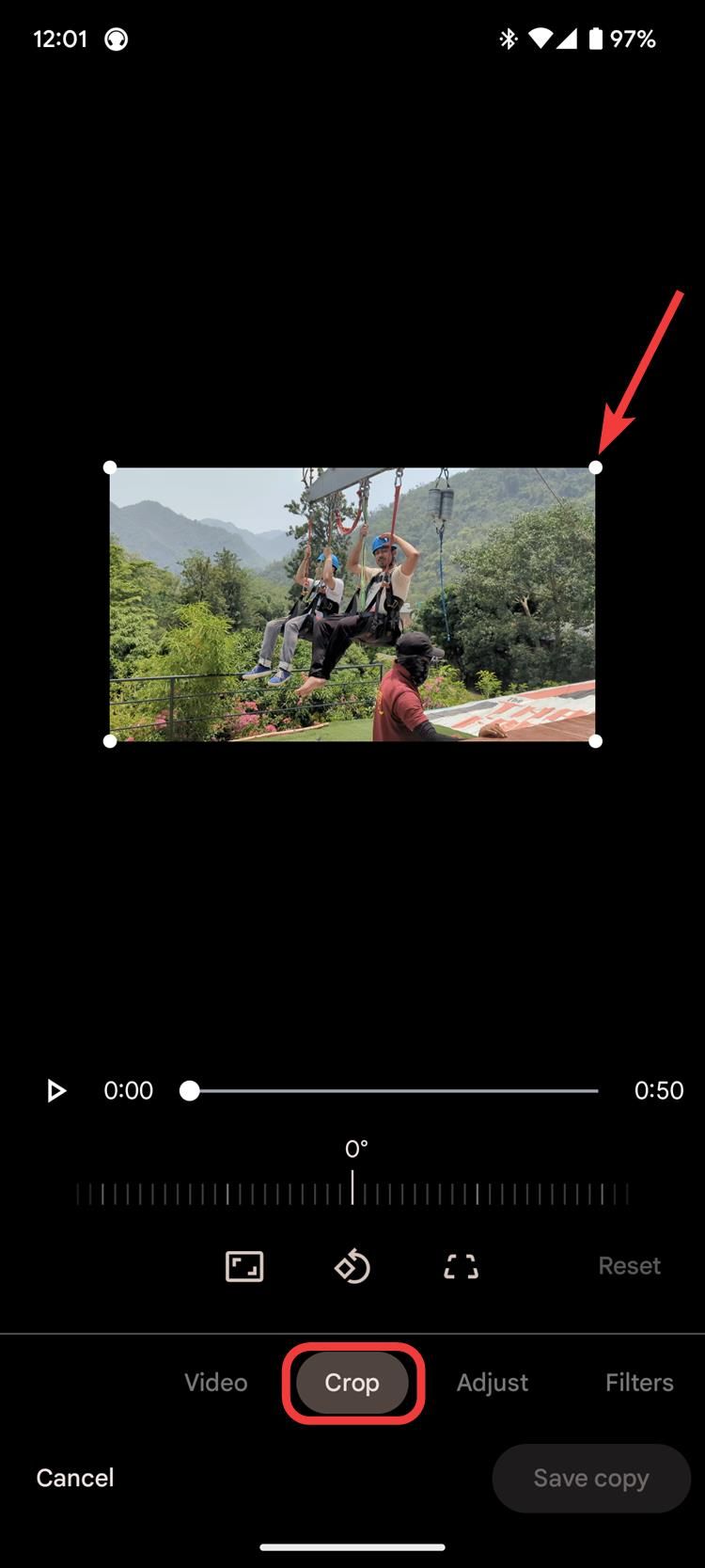 A screenshot of the Google Photos app with a video on the screen. The crop button and size toggles are highlighted. 