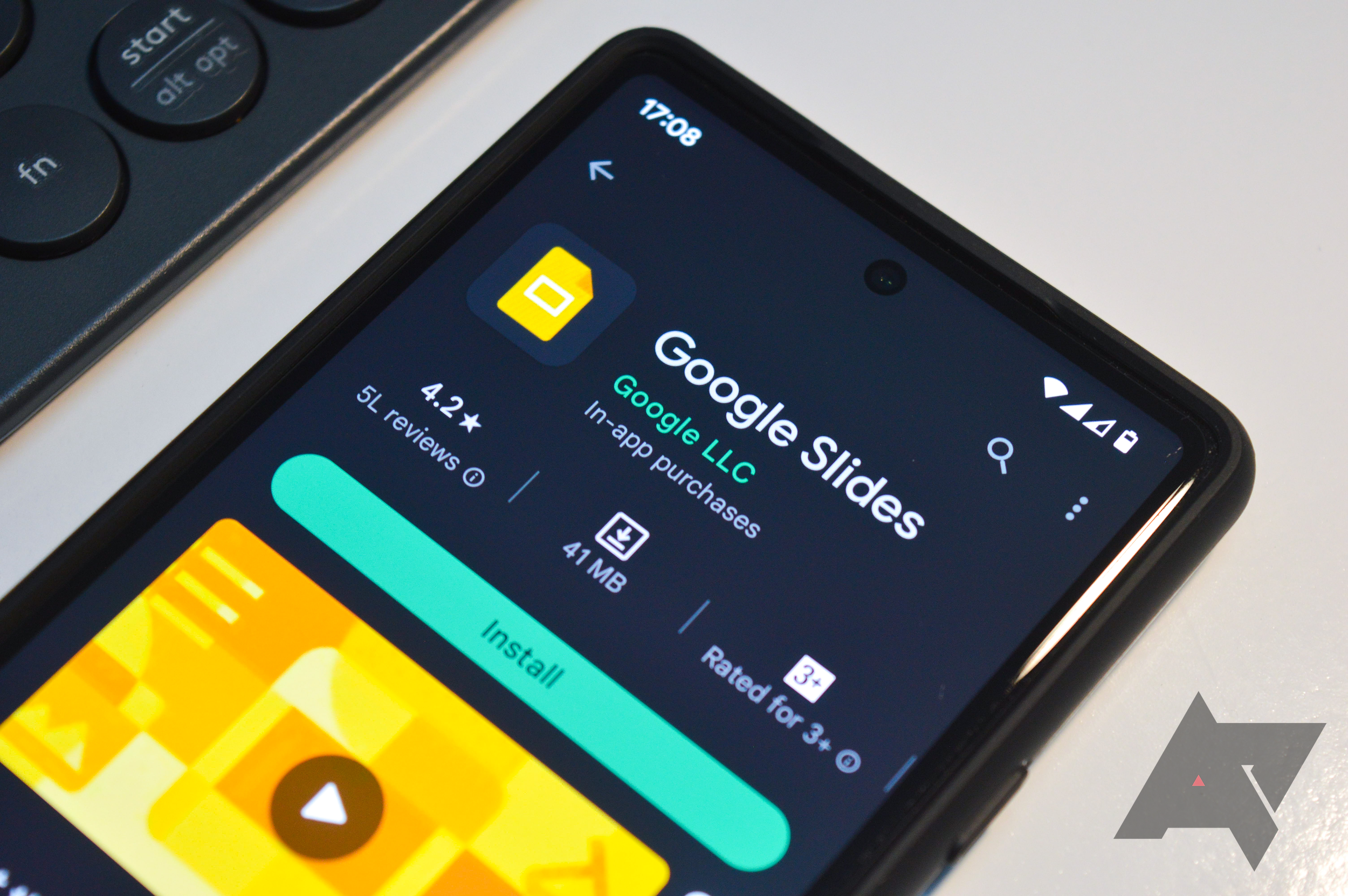A phone showing the Google Slides app in the Google Play Store