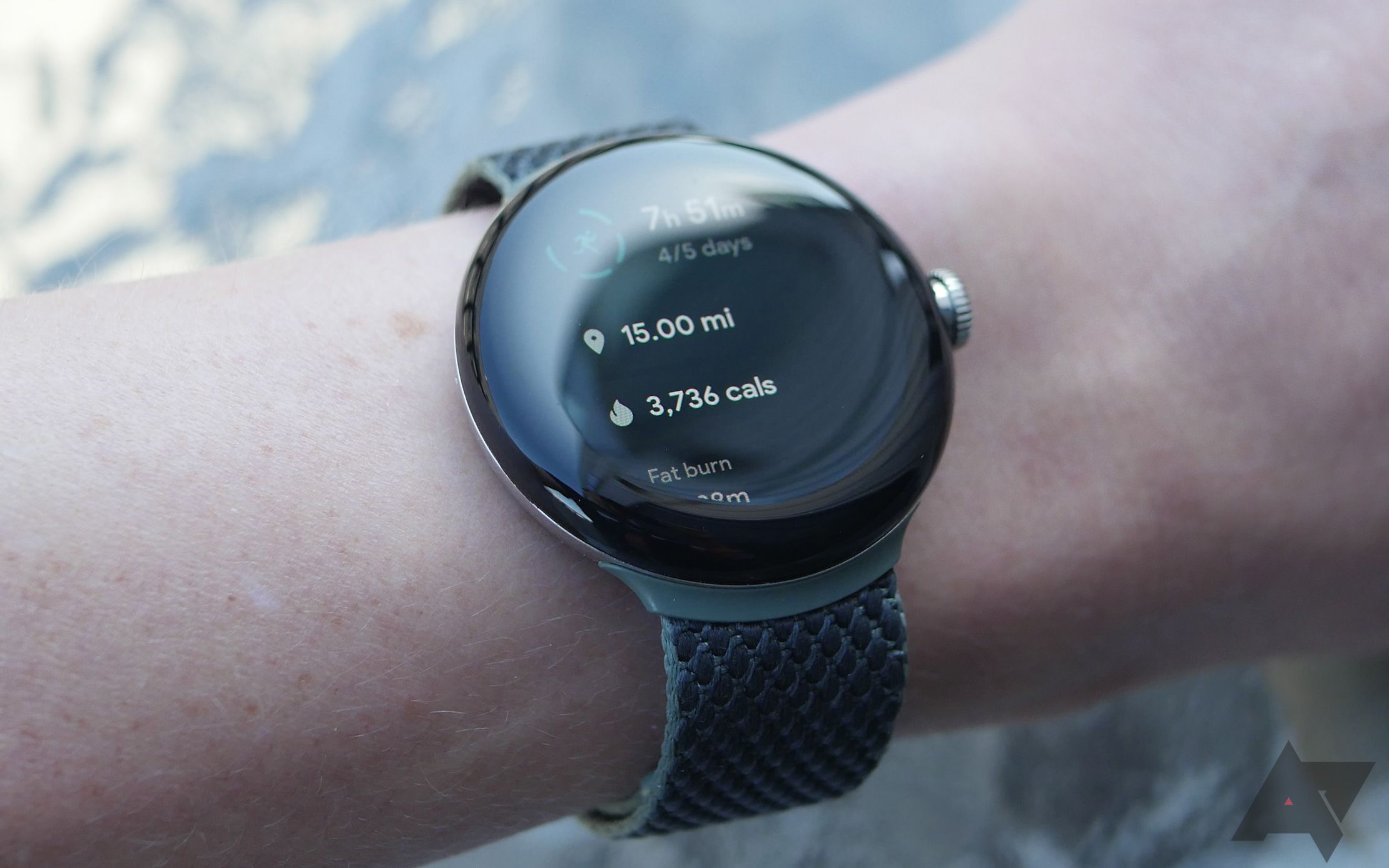 A smartwatch showing workout data.