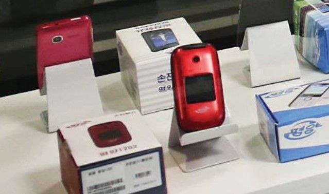 red clamshell smartphone on display