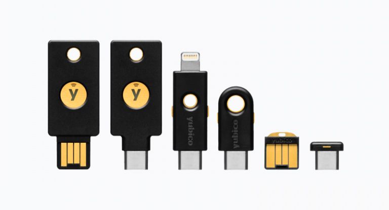 an assortment of YubiKey key fob security tokens
