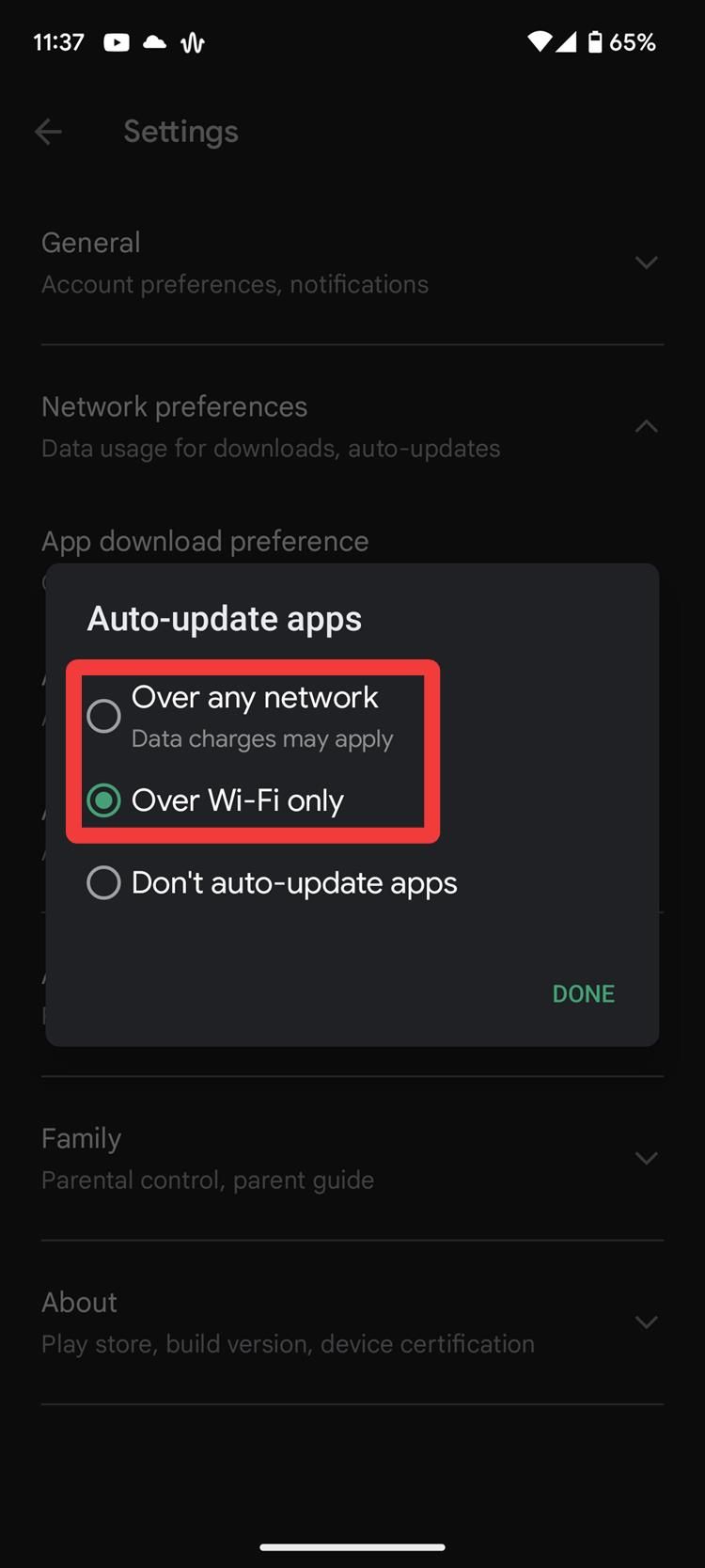 The Google Play Store Auto-update apps dialog box with a red box around the Over any network and Over Wi-fi only options