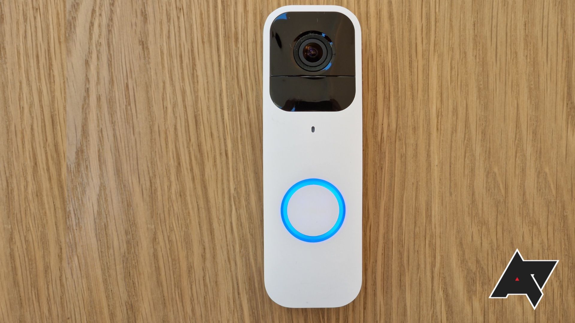 The Blink Video Doorbell white color option on a desk