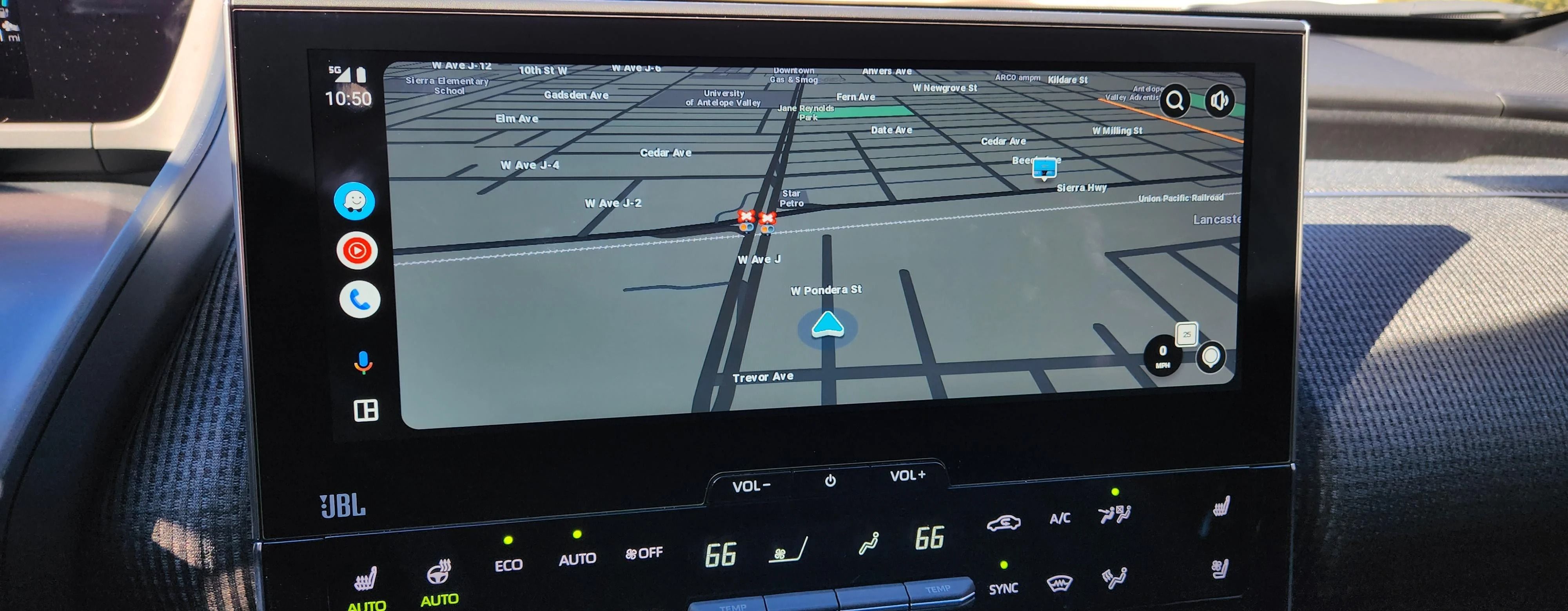 Wyze running on Android Auto's redesign on a wide in-car display.
