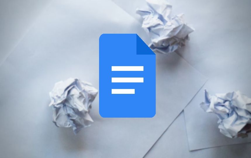 Deleted pages that are crumpled up and scattered around the Google Docs logo