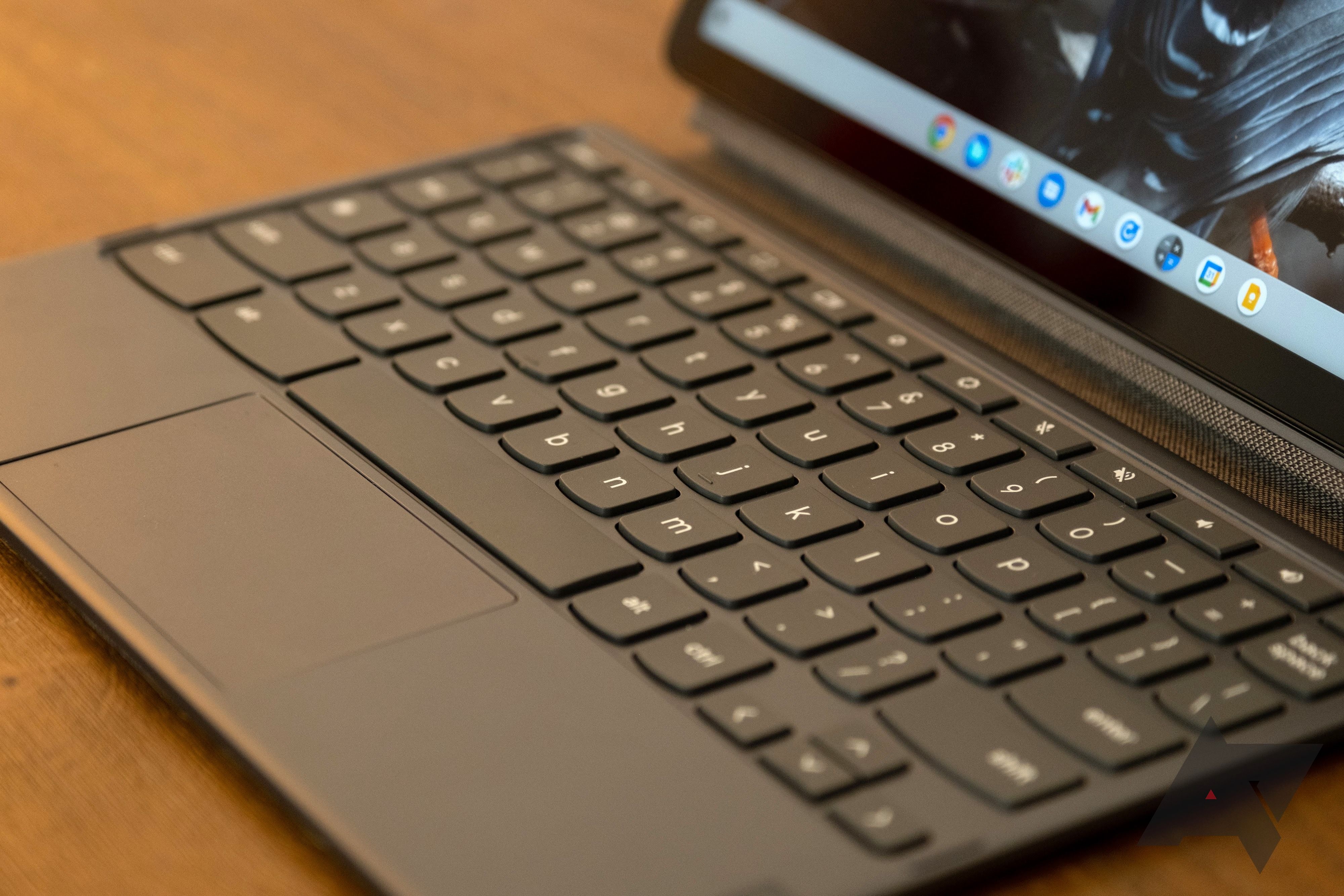 A Lenovo Chromebook Duet 3's keyboard sitting on a wooden surface