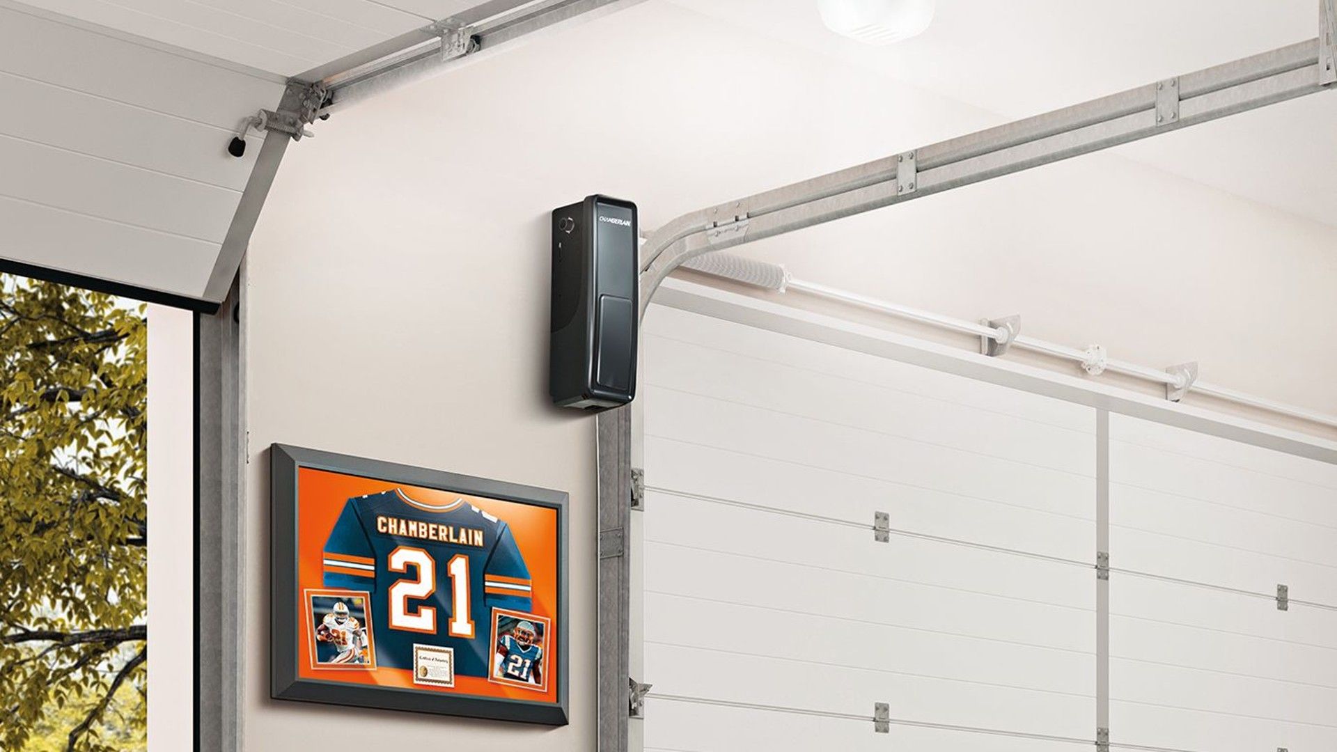 Chamberlain RJO70 smart garagedoor opener in between open and closed garage doors