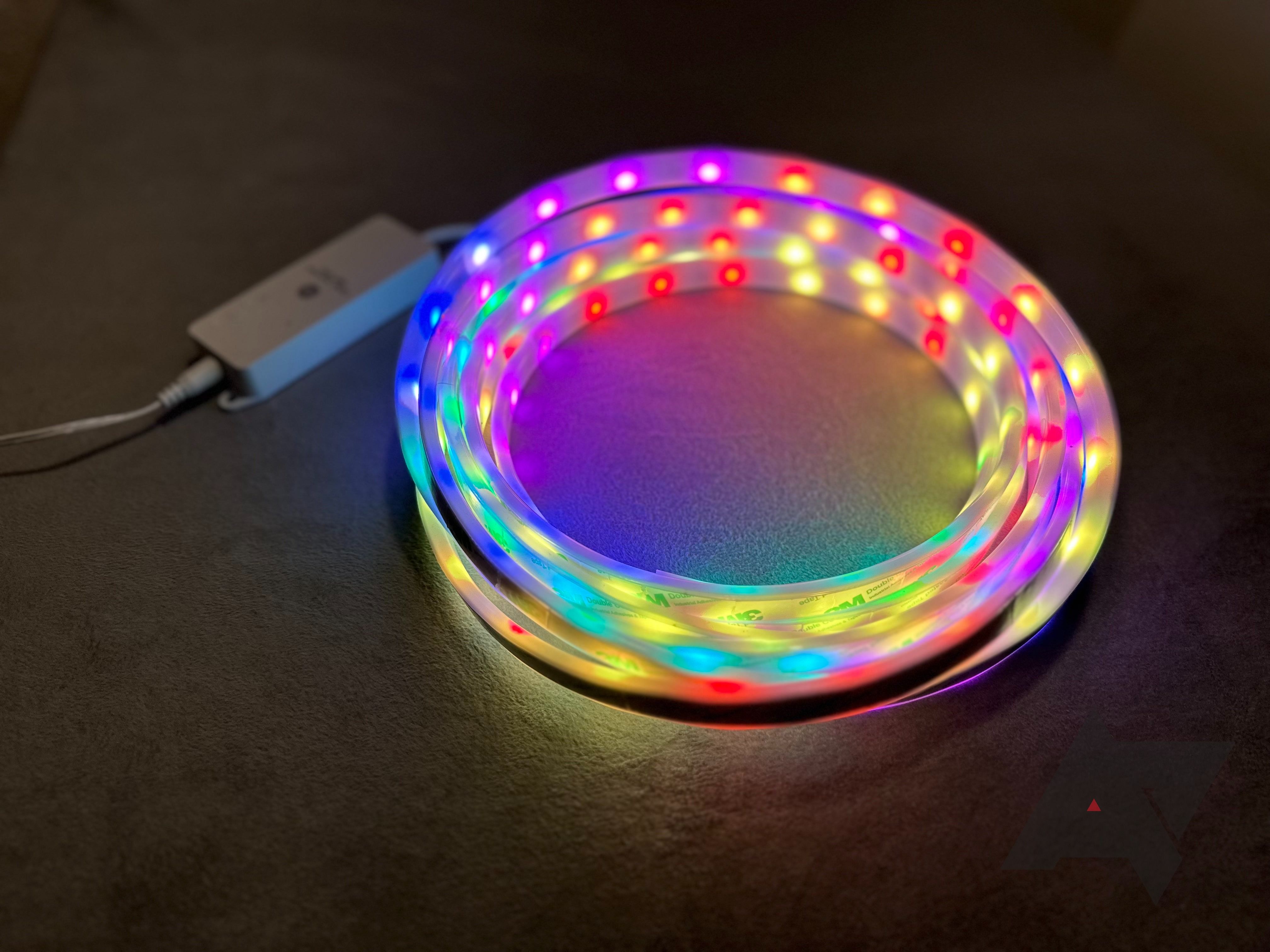 GE's Cync Full Color Dynamic Effects Smart Light Strip coiled up, with RGB lights on.