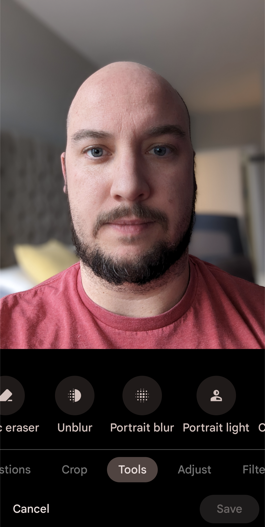 An image of a person in a red shirt in the Pixel's camera app with the tools icon selected. 