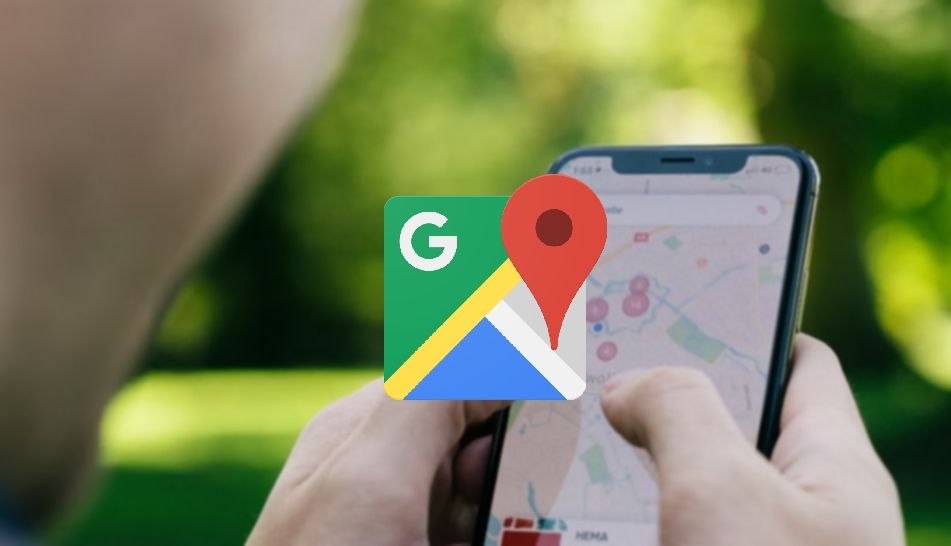 Person holding phone with Google Maps mobile app on display