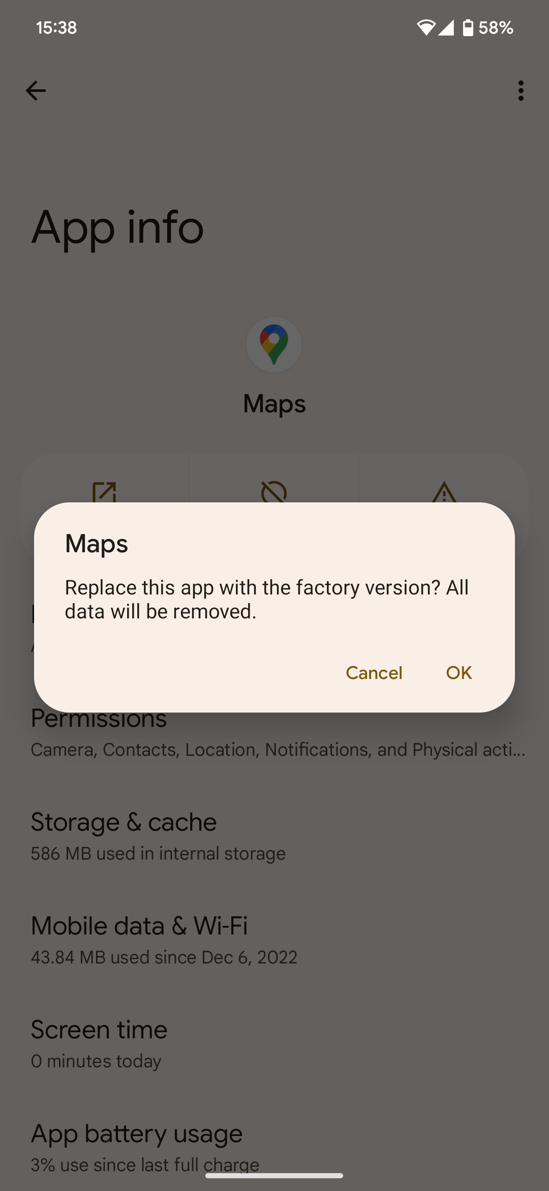 Screenshot of prompt to replace current app version with factory version on an Android system app
