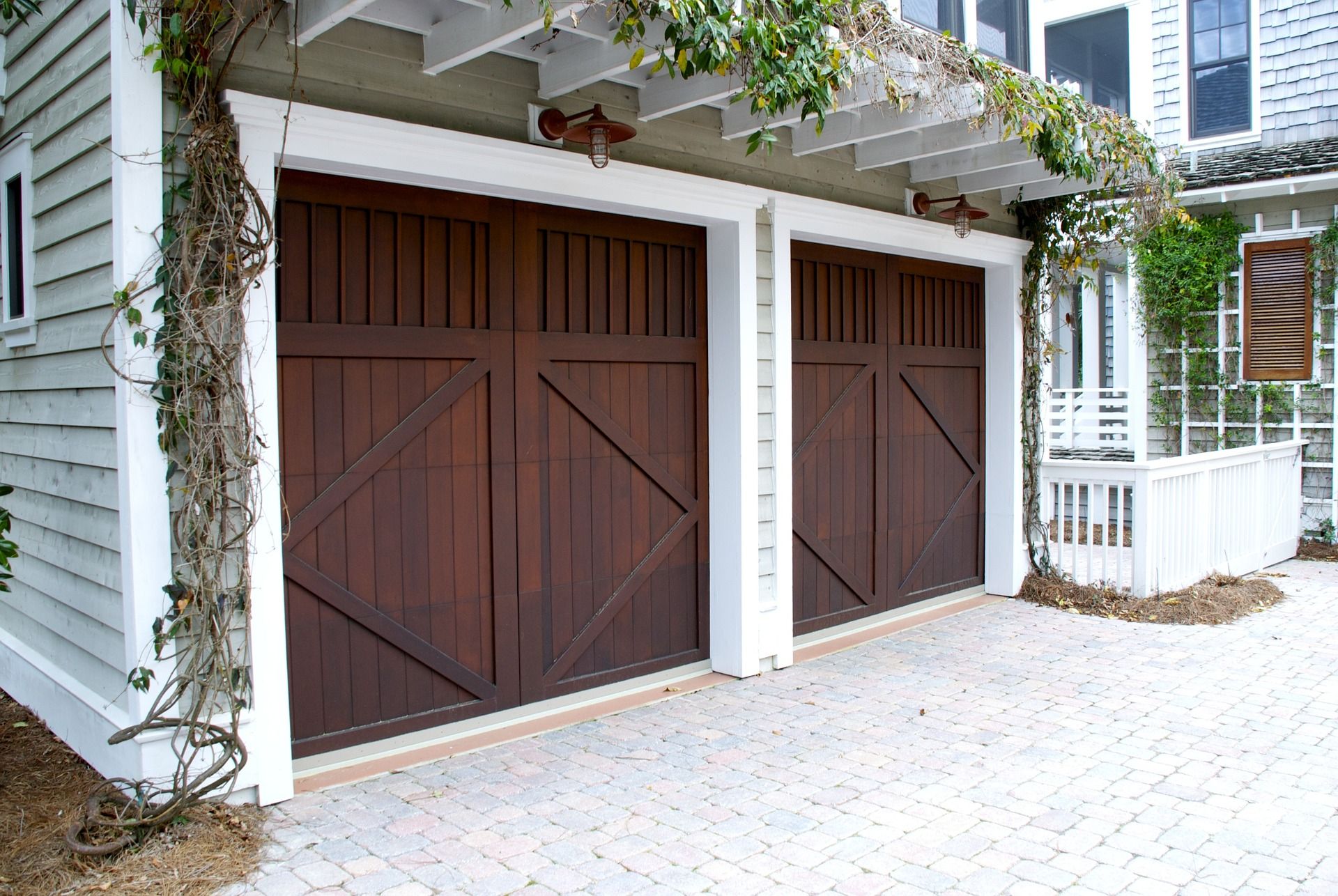 Garage door and driveway in front of a house
