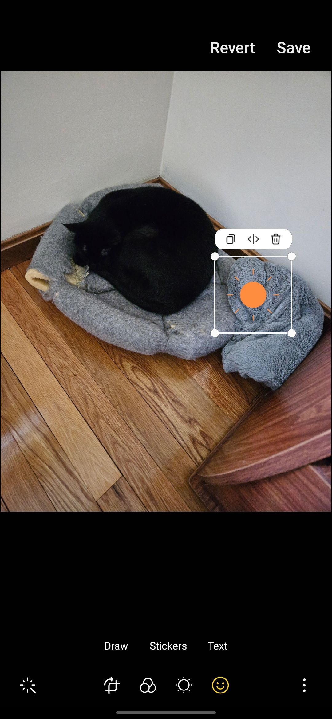 Editing a sticker on a photo in the Samsung Gallery app